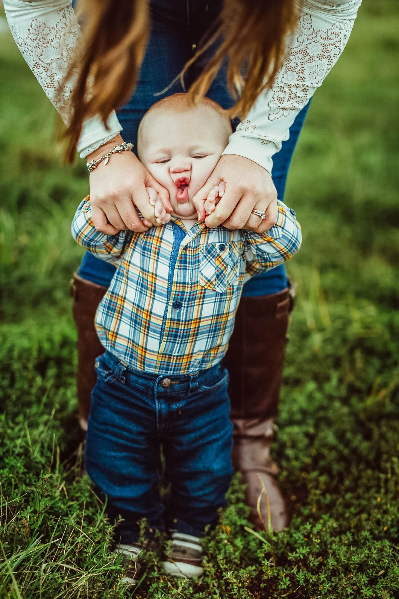 mother squeezing childs face.jpg
