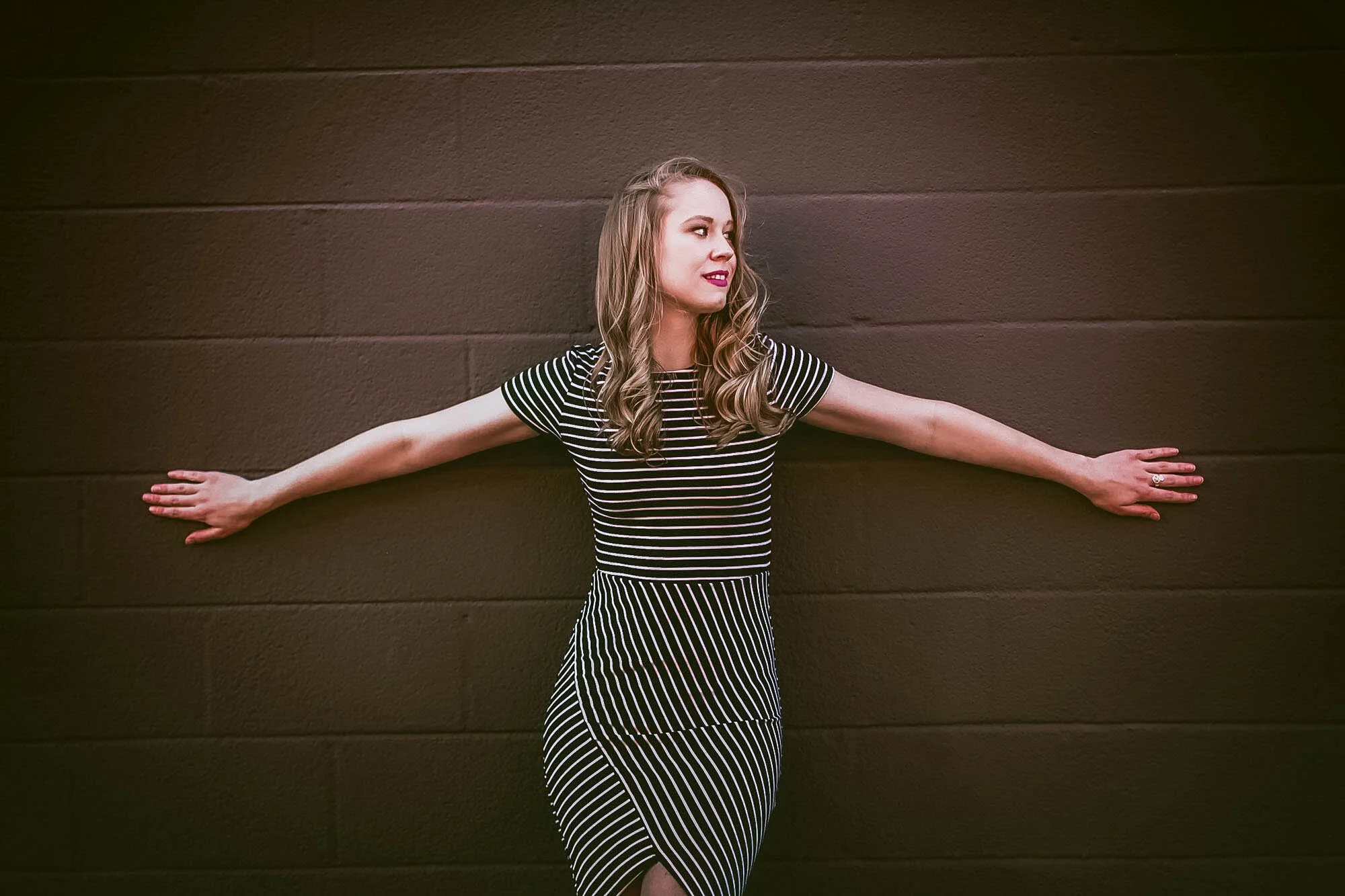 woman leaning against wall.jpg