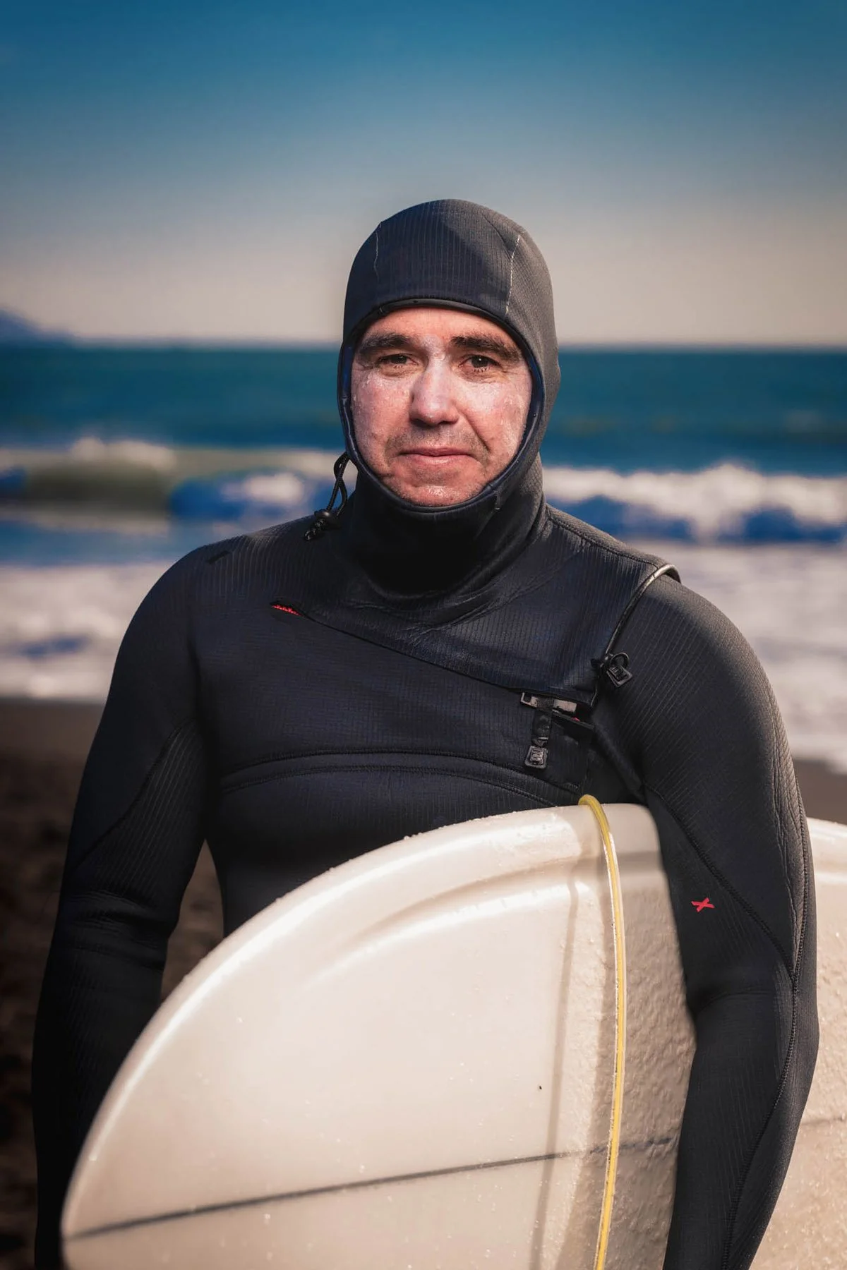 make surfer in wetsuit