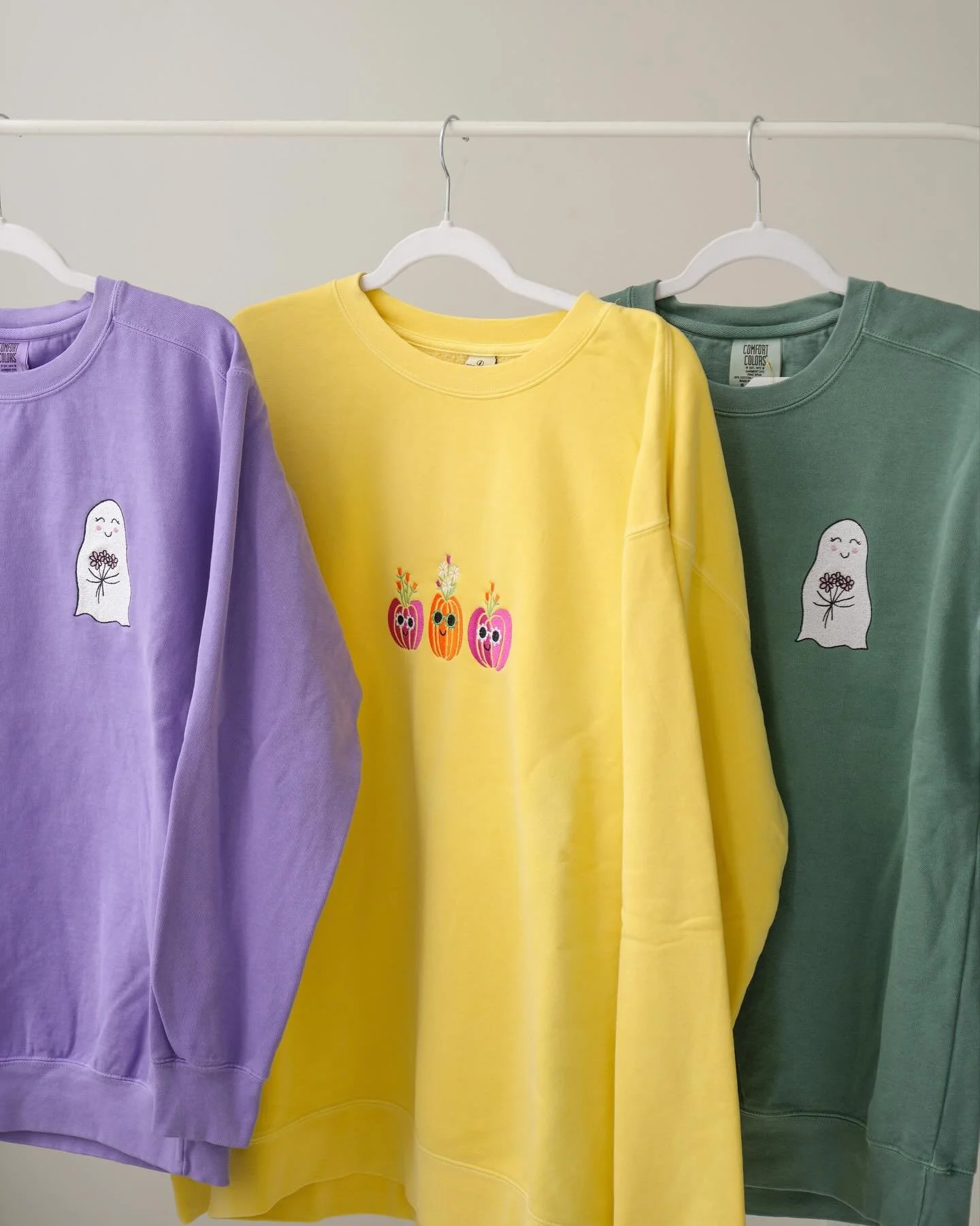 use code HEYGHOUL to get $15 off the remaining halloween crewnecks👻✨ which one is your favorite? pumpkins with sunglasses🎃 or the floral ghost👻 vote!