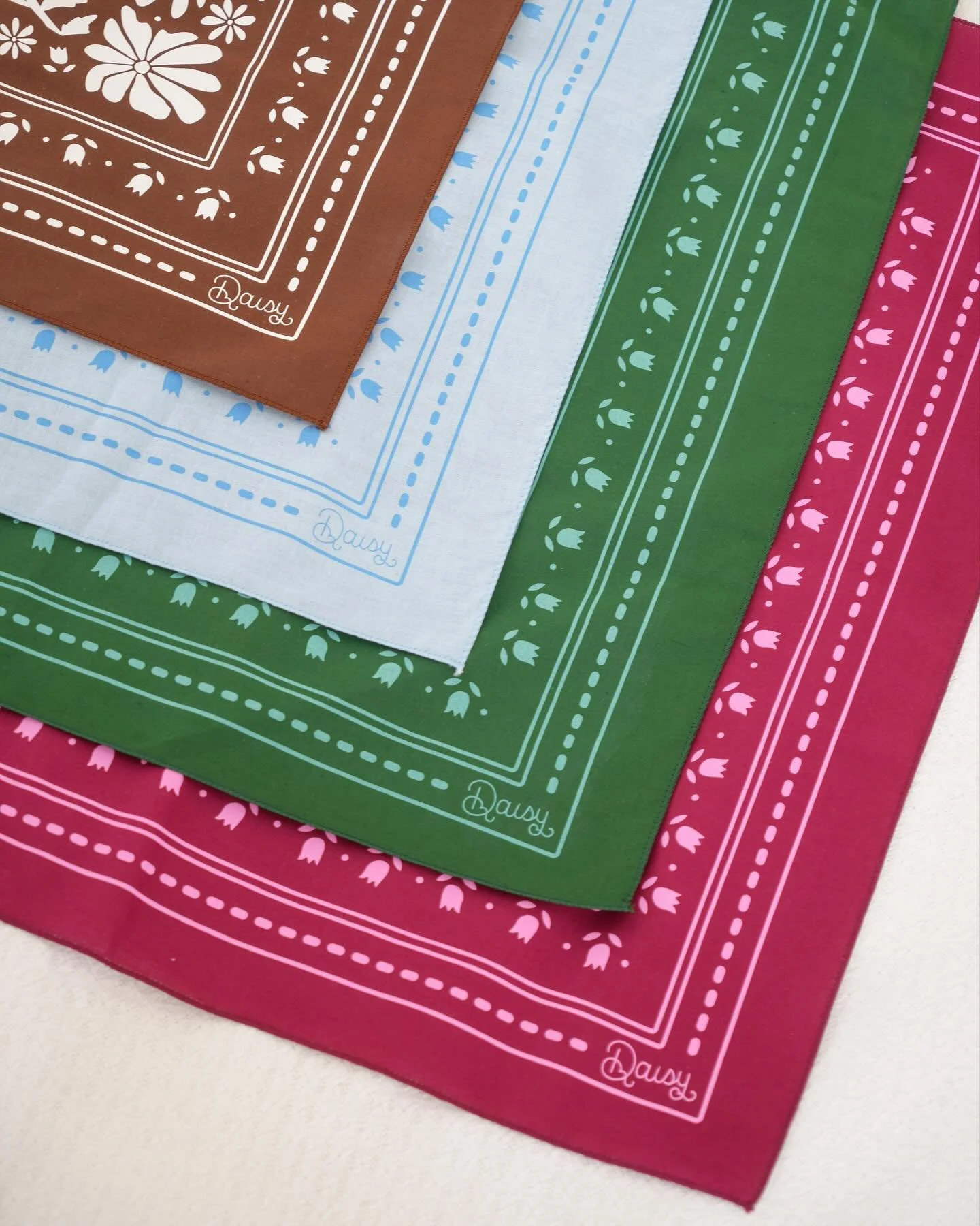 LAUNCHING TOMORROW✨ comment which color bandana you’d choose & I’ll pick one comment to send one to💌🫶🏻 USA Made bandanas that are screenprinted by another small business using my original design🌼 so excited to be checking these of