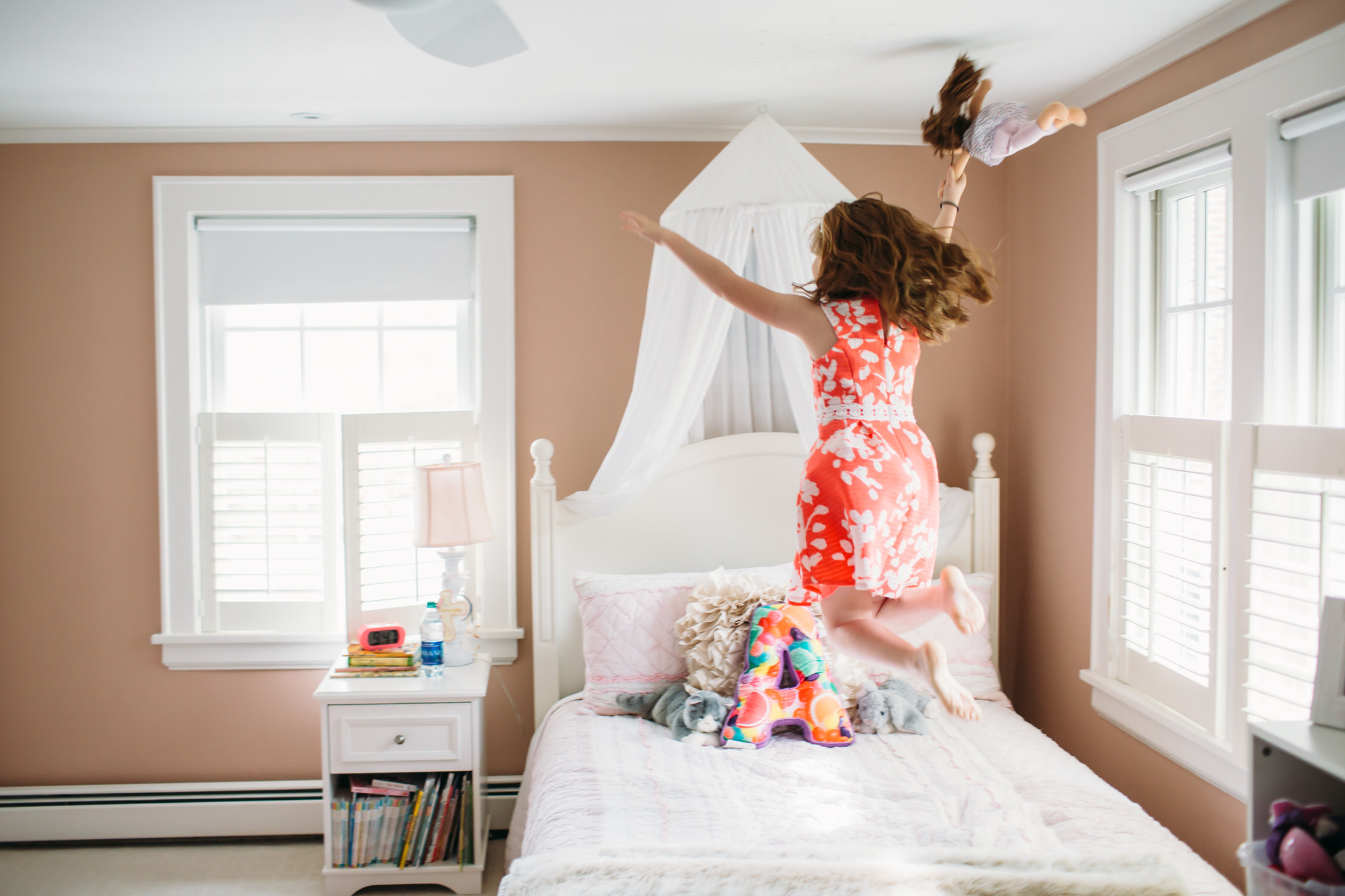 Kids jumping on the bed, Lifestyle family photos at home, Darien Connecticut