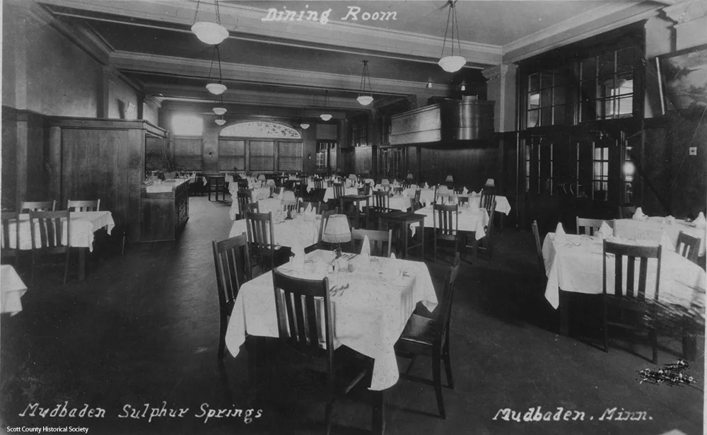 Dining room in 1910s. Scott County Historical Society.