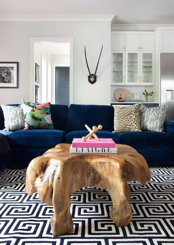 Transitional Living room with Blue sofa and geometric rug (1).jpg