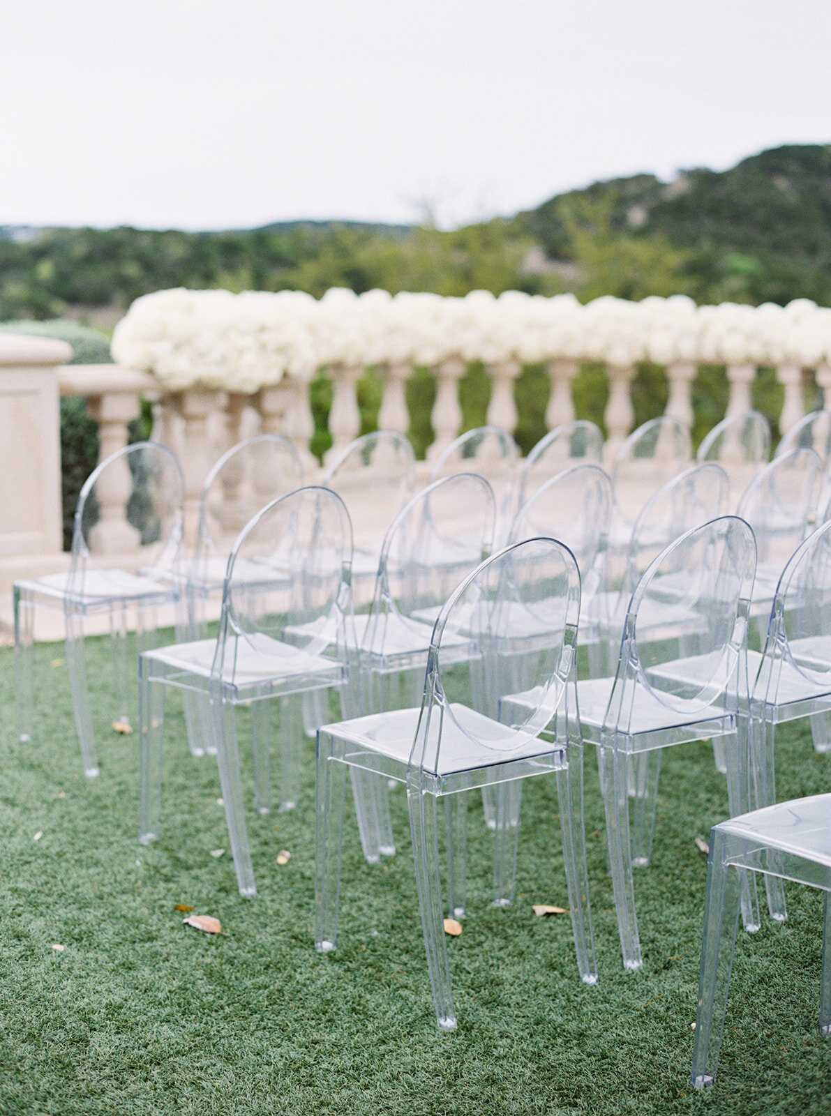 ghost chair outdoor ceremony.jpg