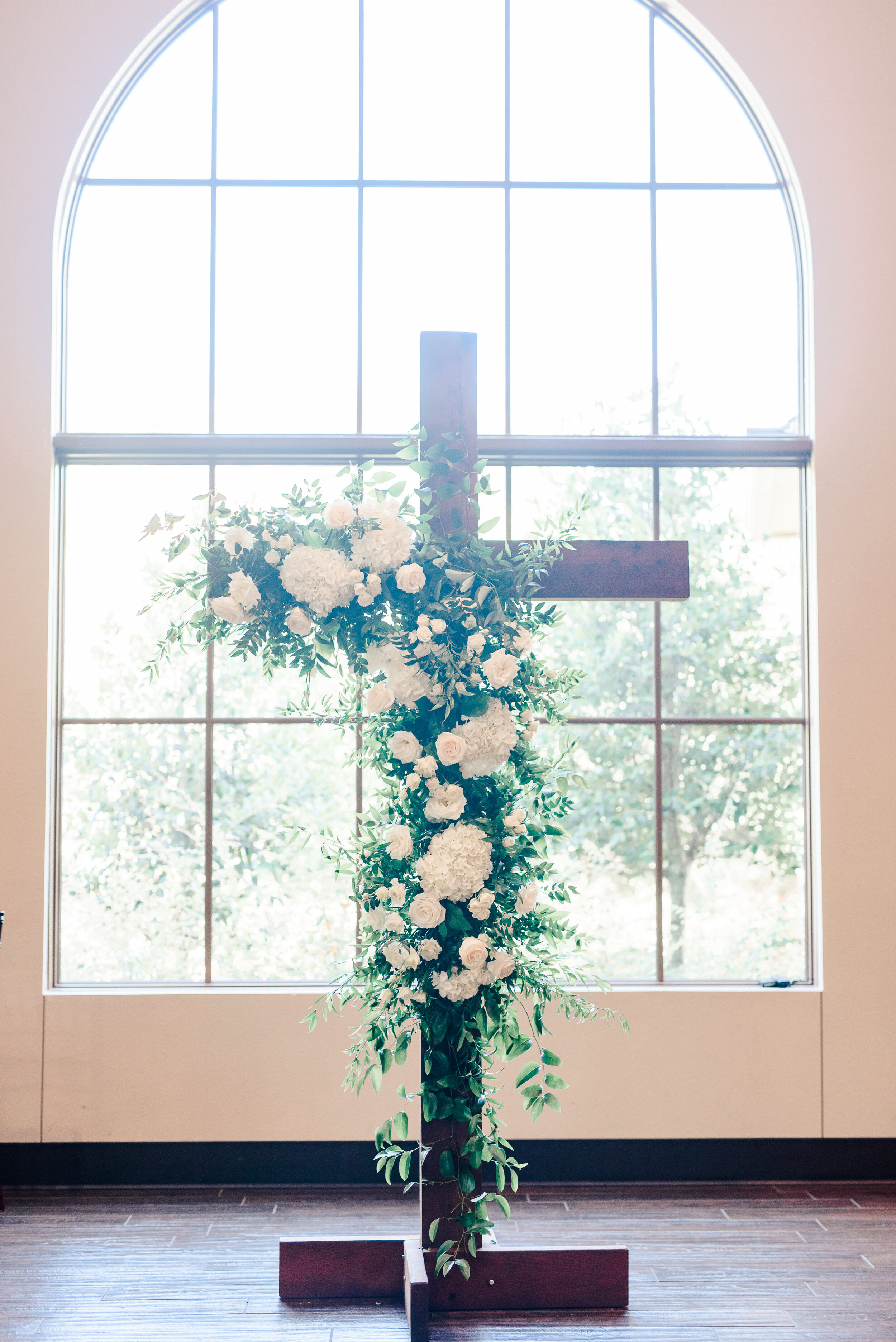 classic white and green ceremony floral backdrop - pink champagne paper