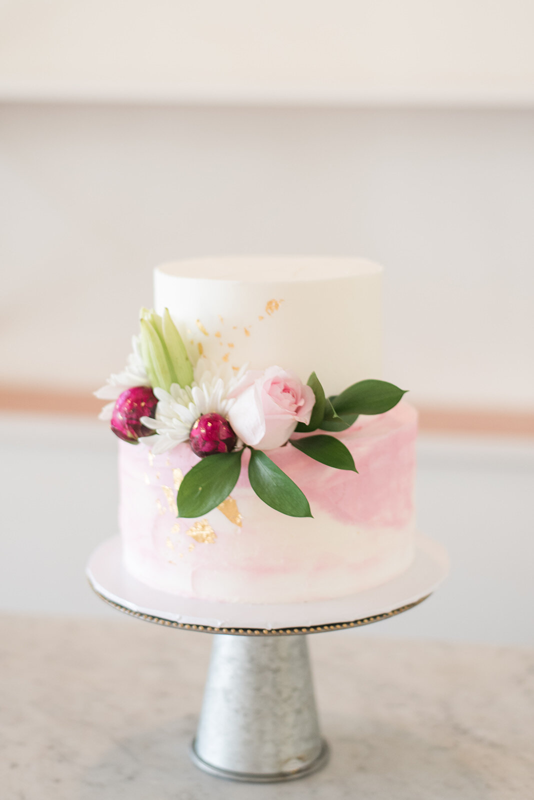 spring watercolor wedding cake with pink champagbe designs.jpg