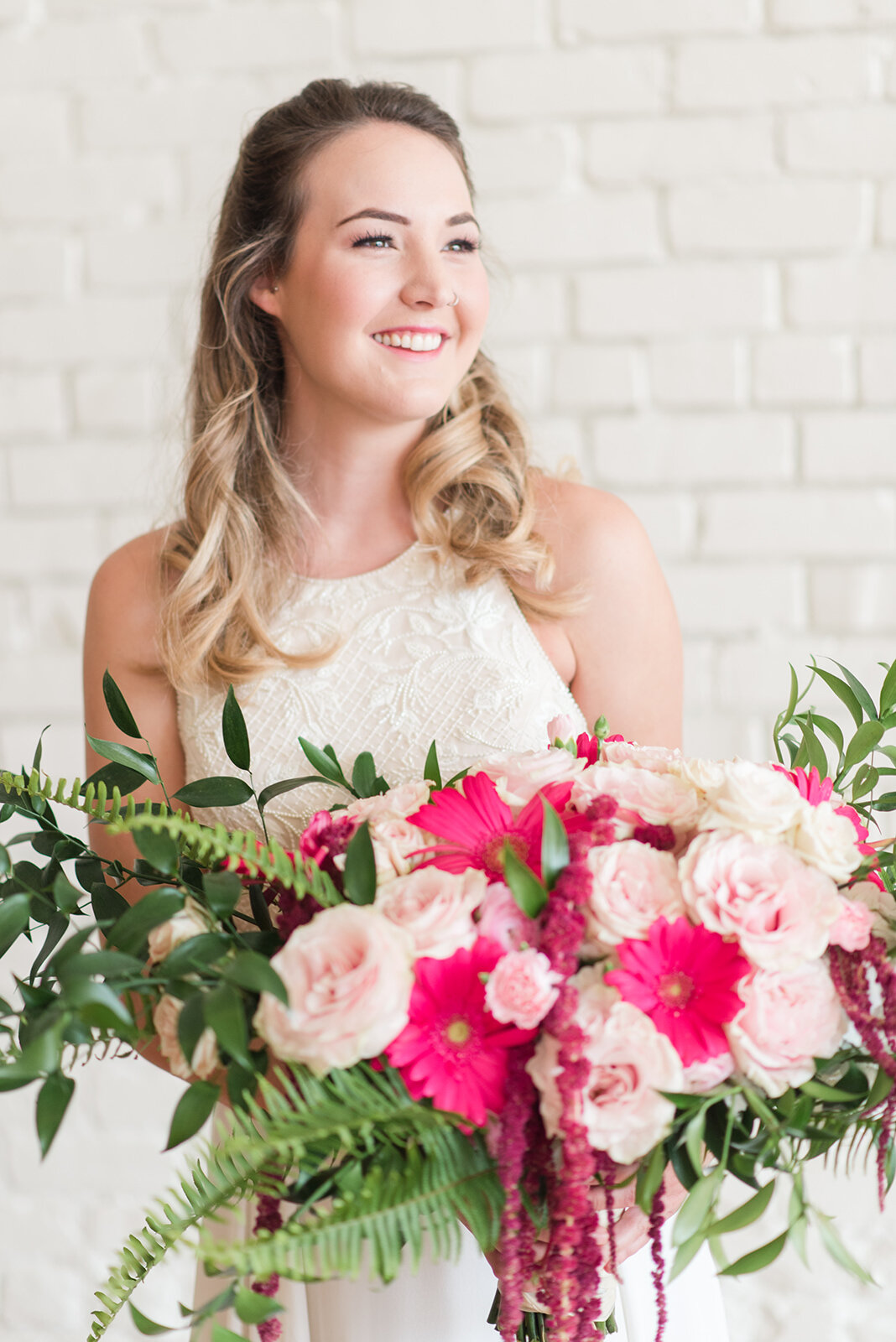 vibrant spring floral bouquet for shoot with pink champagne designs.jpg