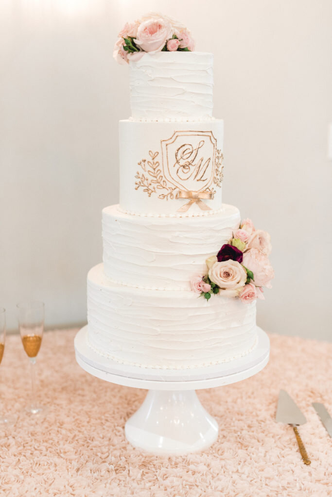 wedding monogram cake with pink champagne designs monogram.jpg