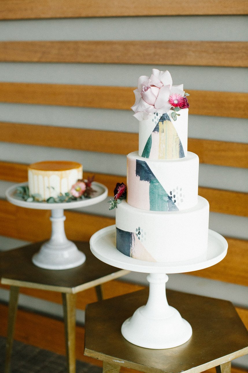 contemporary colorful wedding cake with design by pink champagne designs.jpg