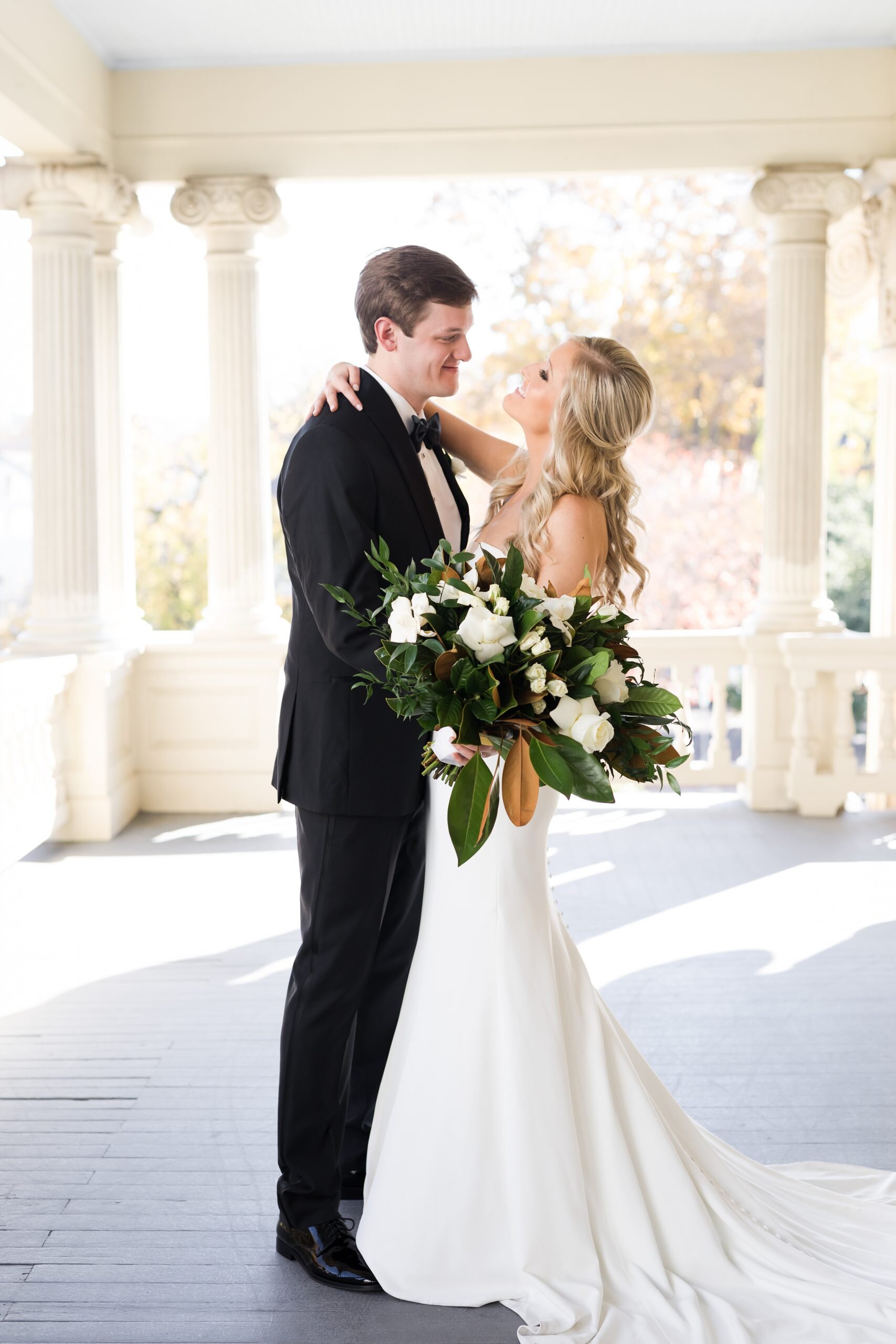 bride and groom with pink champagne designs.jpg