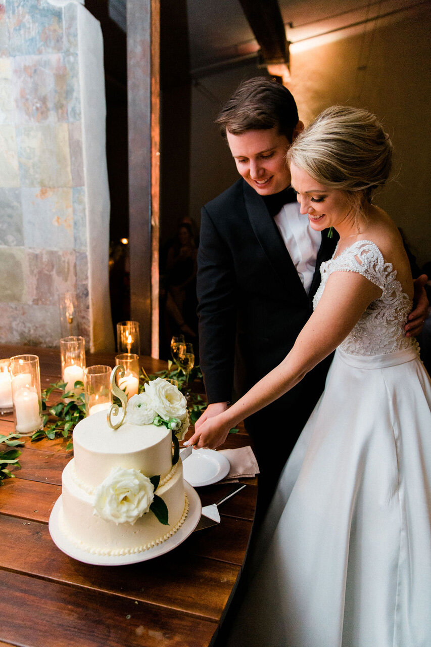 wedding cake with pink champagne designs.jpg