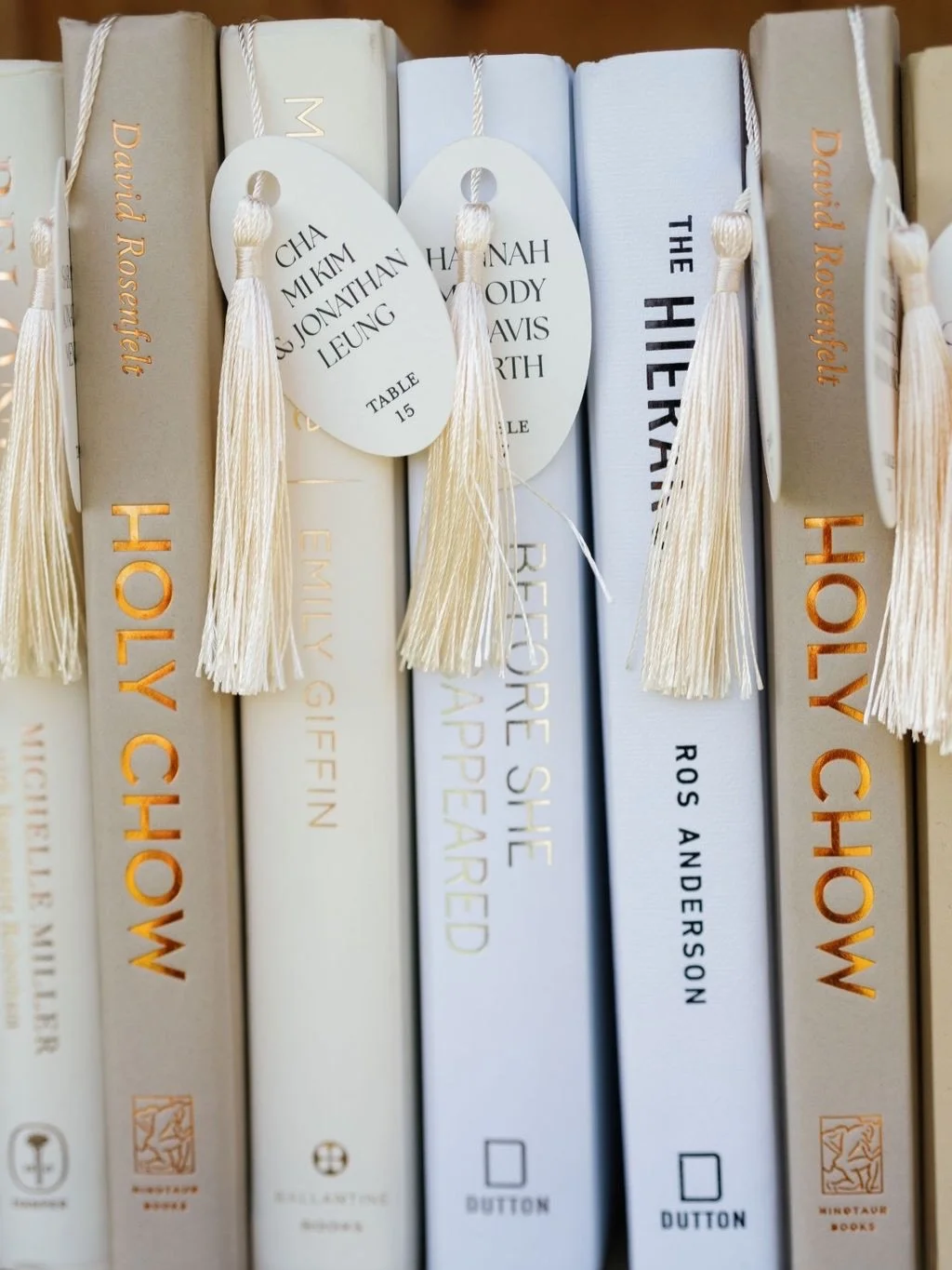 Will always love this idea of incorporating your true selves in the small details of your wedding. Bookmark seating display for Ellie and Andrew. 🤍🤍 We loved this from beginning to end - from sourcing all the books to the tassels. 

@abbyjiu 
@bett