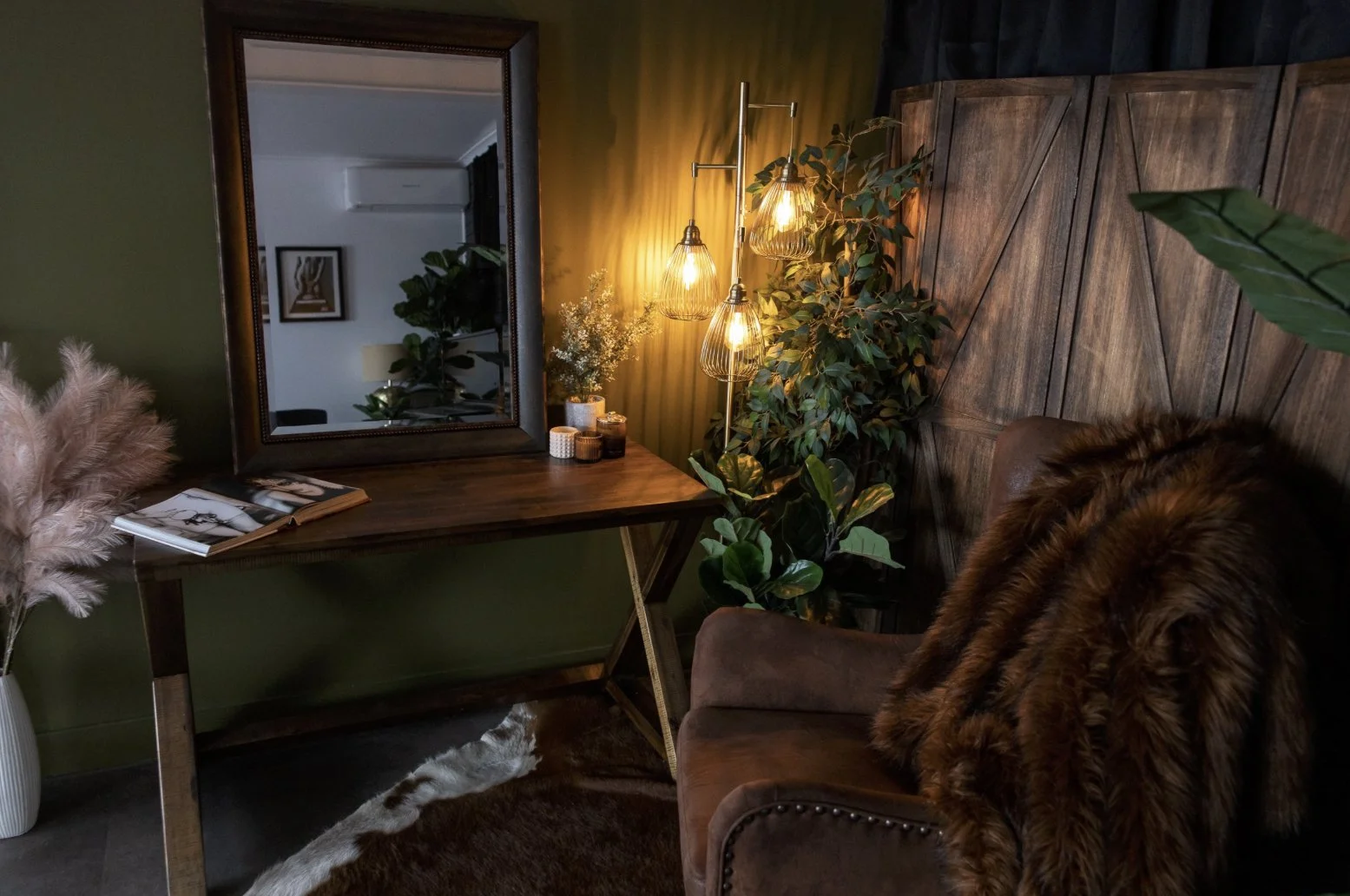 brown and gold boudoir studio set, ambient lighting, greenery