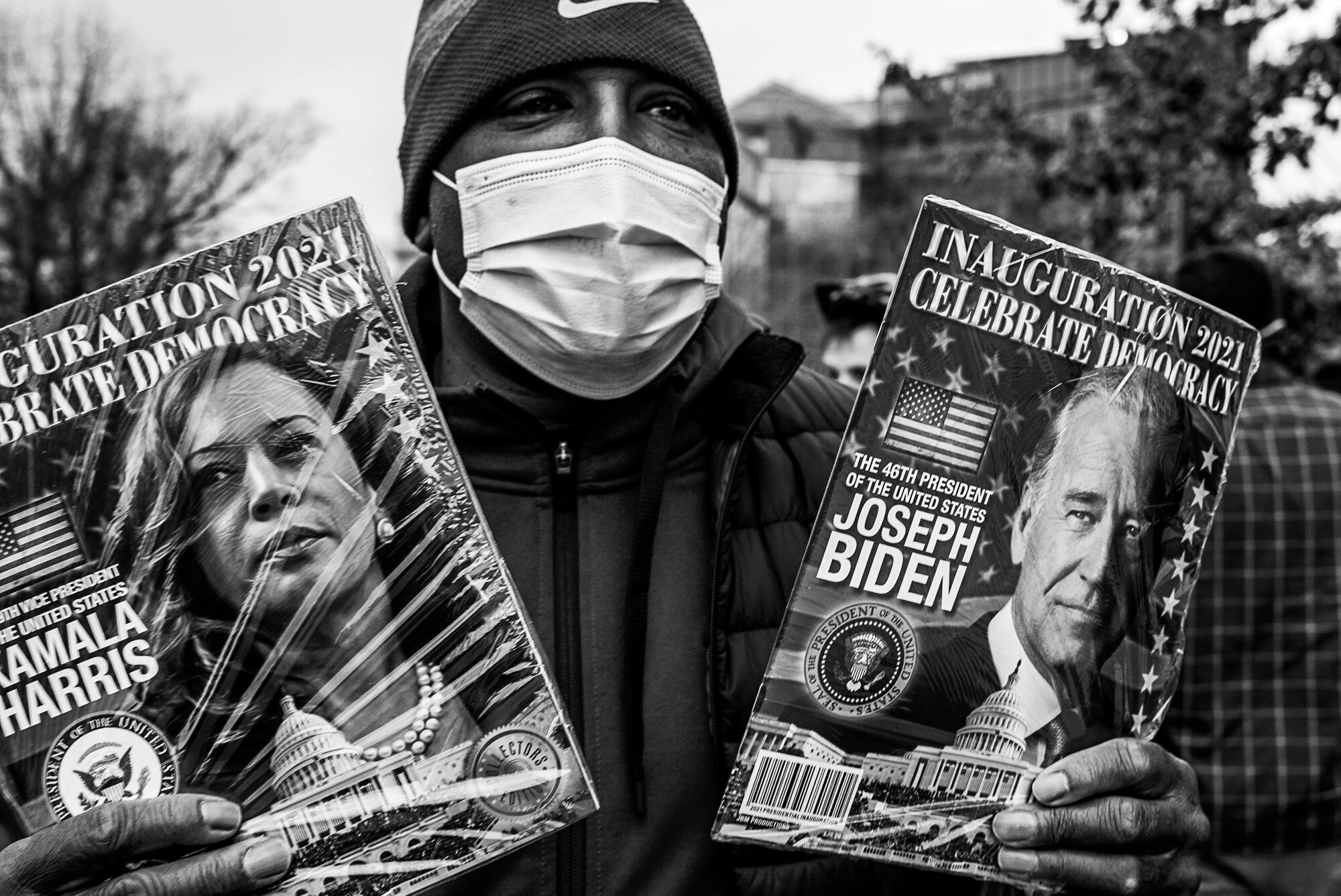  Man with inauguration programs on the north side of the Capitol Building during Joe Biden’s Inauguration. 