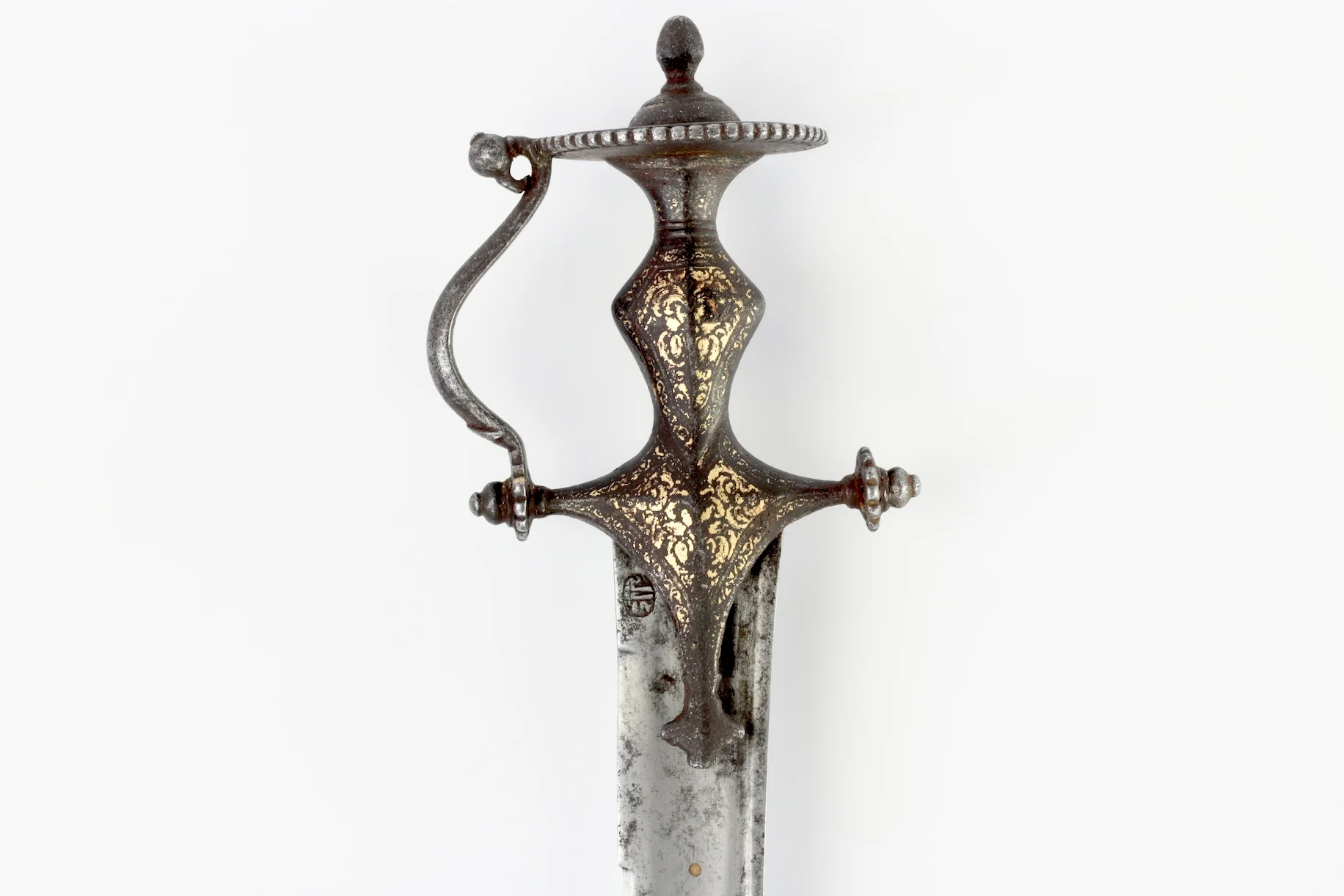 An Indian sword with an inset brass disc. (Source: Mandarin Mansion )