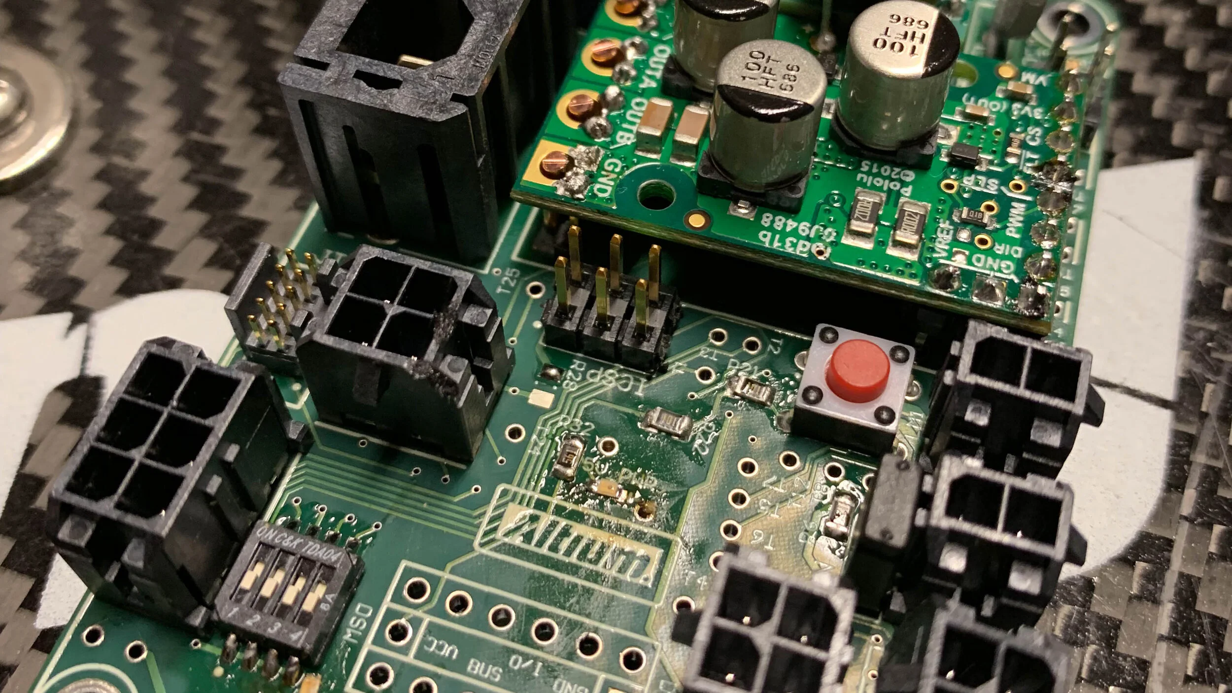  (daughterboard seen in upper right is produced by Pololu Corporation) 