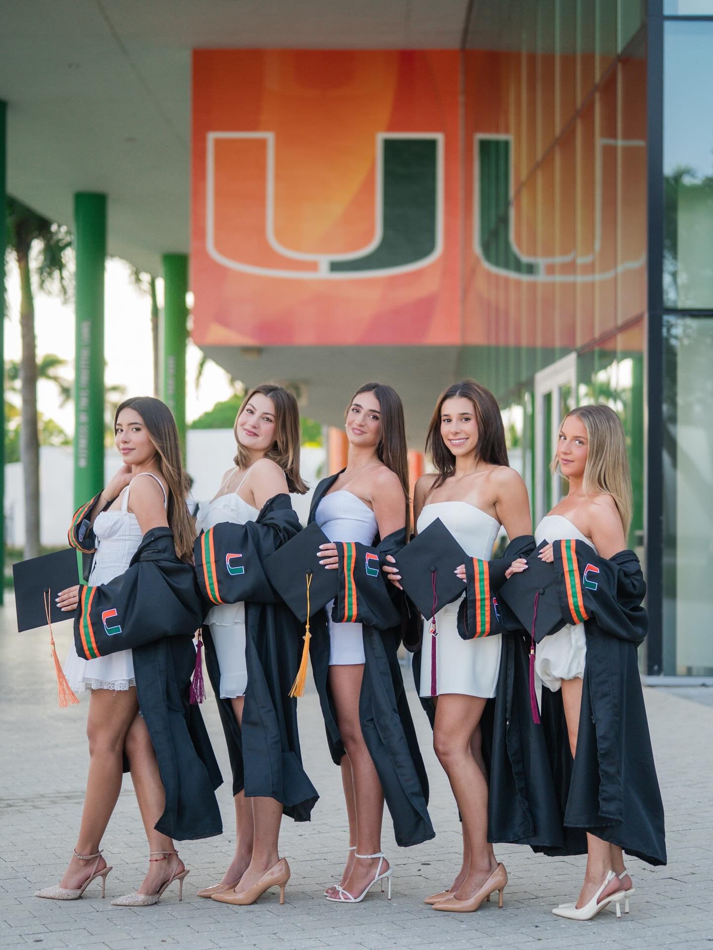 This University of Miami grad photoshoot was the best time!  Besides these friends being together, laughing, and running around campus, they got to take photos with Sebastian, hop into the fountain, sit on top of the U and more!  I loved hanging out 