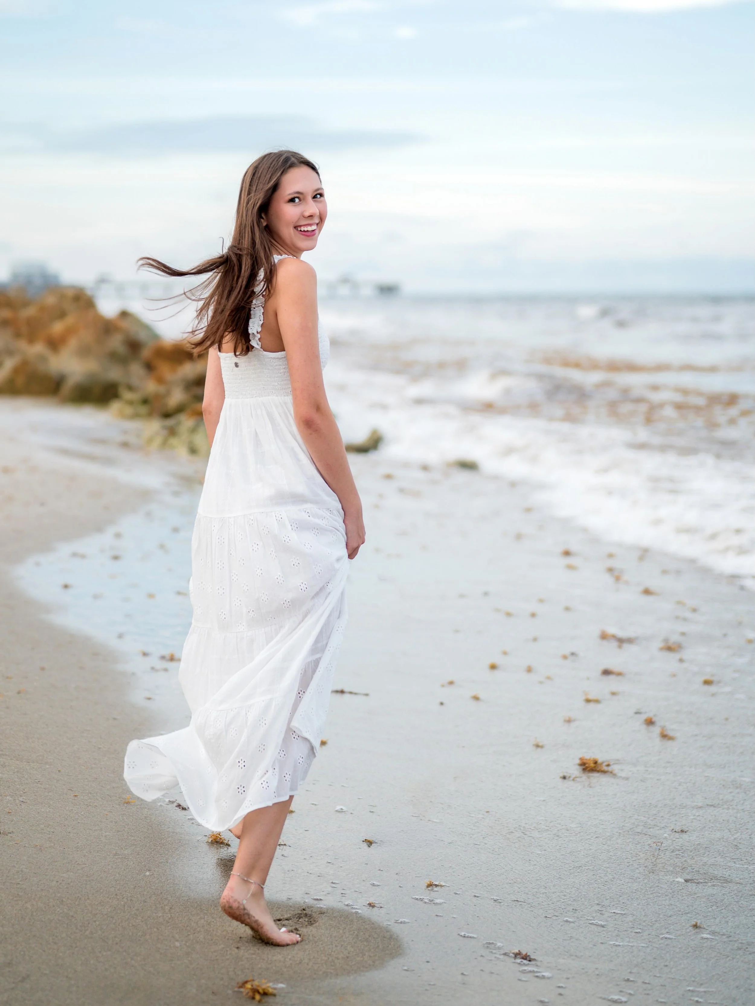 We showed up to the beach last night and were met with 15 mph wind gusts and a shoreline that was completely covered in thick seaweed. Most people would have panicked and called off the shoot&mdash;but we had a different plan.
Instead of fighting the