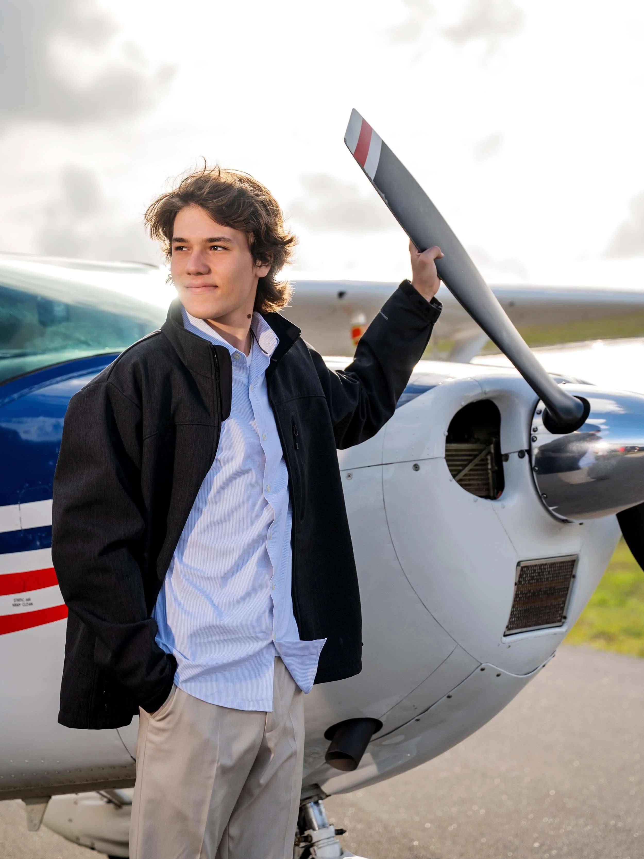 Such a cool senior shoot with Jackson at the Fort Lauderdale Executive Airport! ✈️ Incorporating something you love into your senior photoshoot can make it even more special.  Congrats Class of 2026! 
.
#seniorphotographer
#seniorportraitphotographer