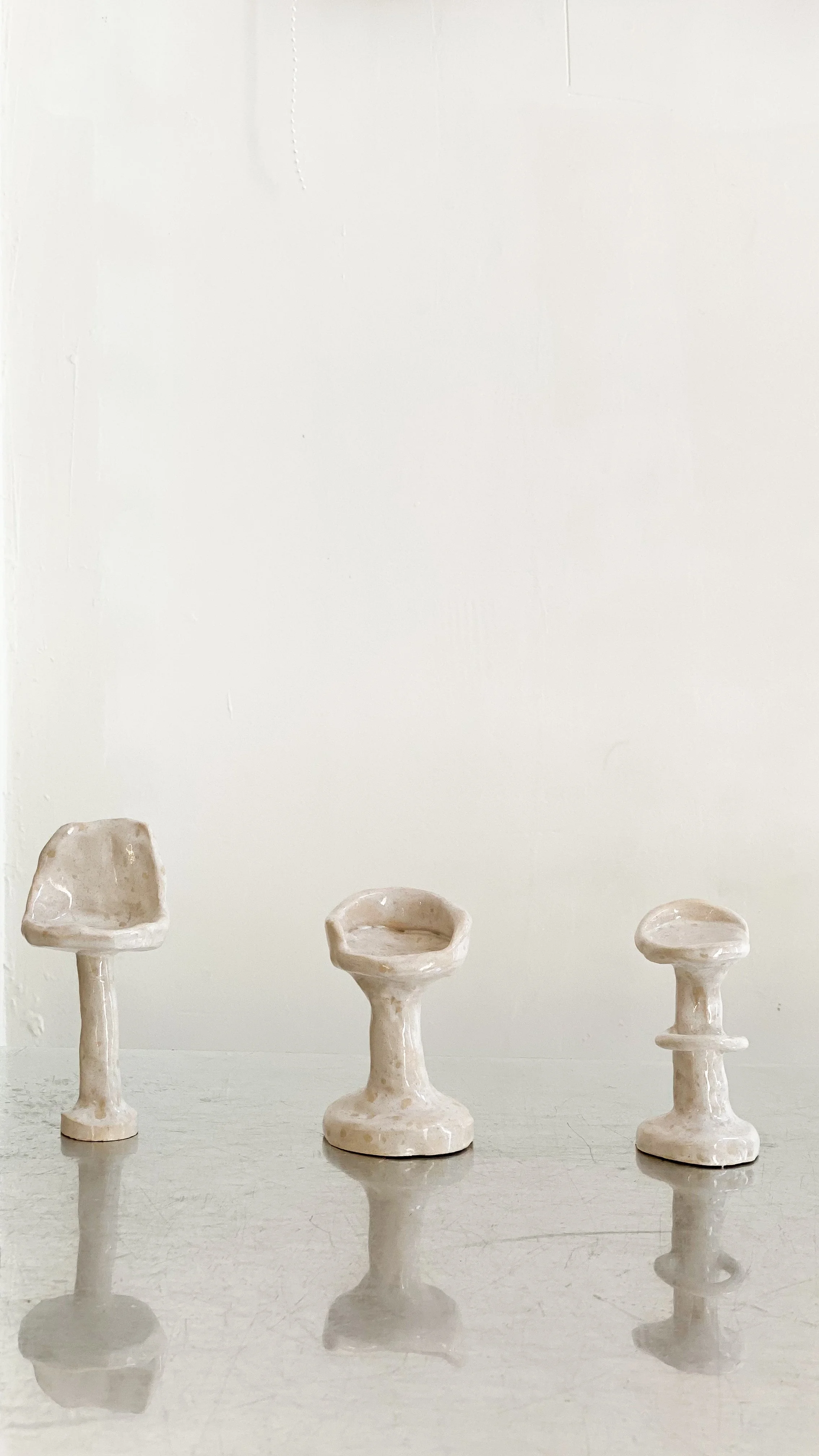 Charly Lotta, ceramic stools.jpg