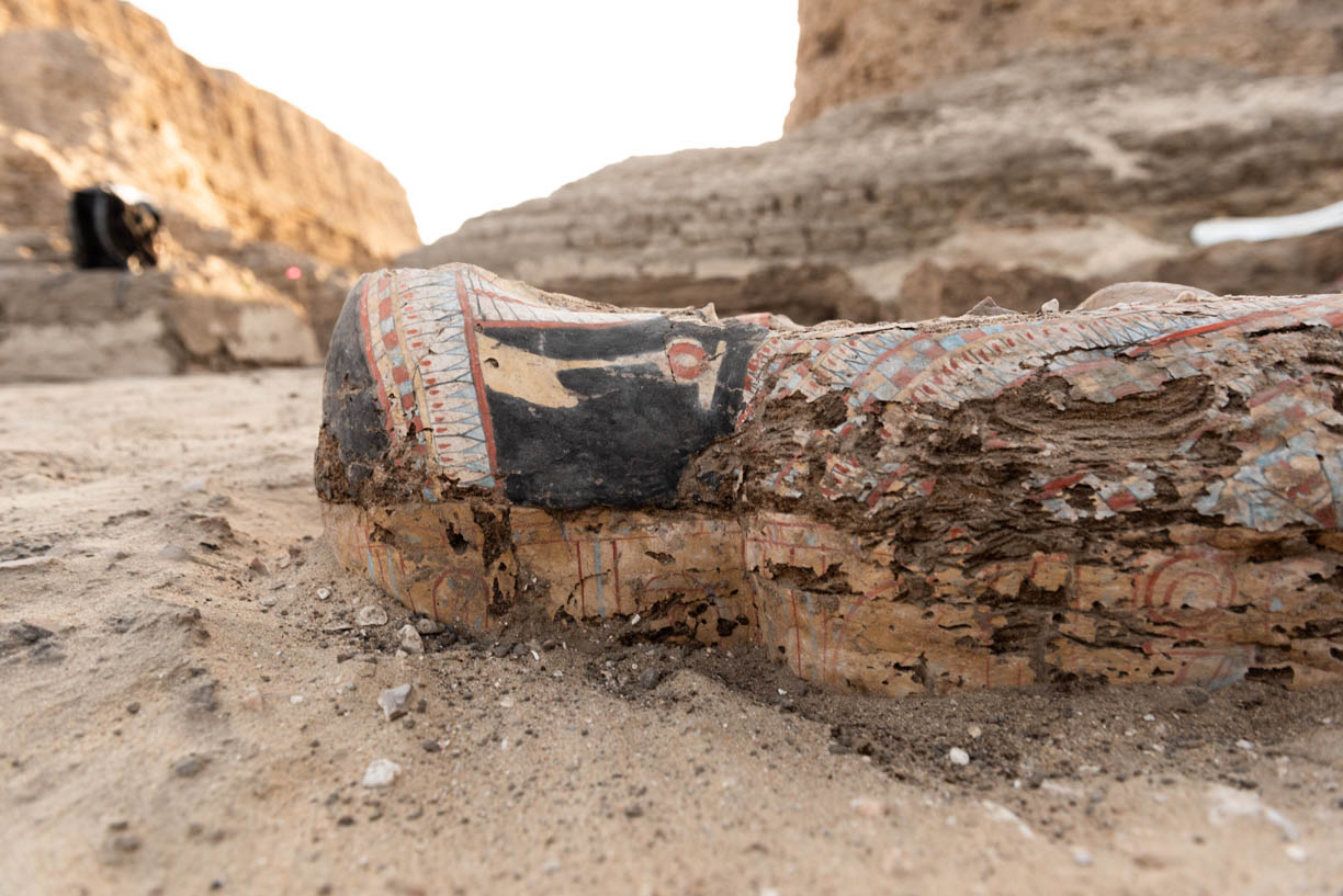 Fig. 1. Painted, anthropoid coffin in situ, outside the east corner gateway of the Shunet el-Zebib. Photo: Ayman Damarany / North Abydos Expedition © 2019