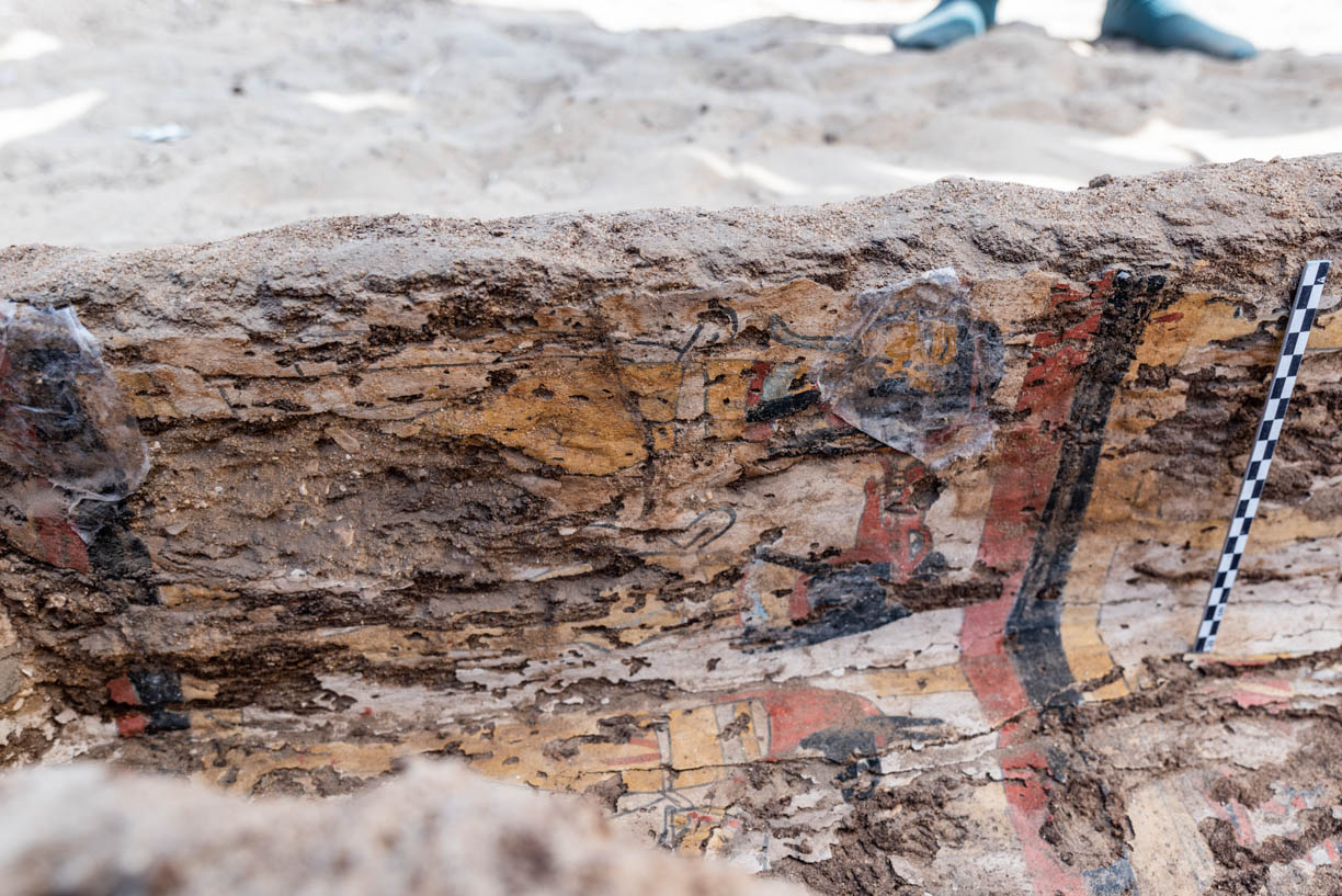 Fig. 8. Facing the painted interior of the coffin. Photo: Ayman Damarany / North Abydos Expedition © 2019