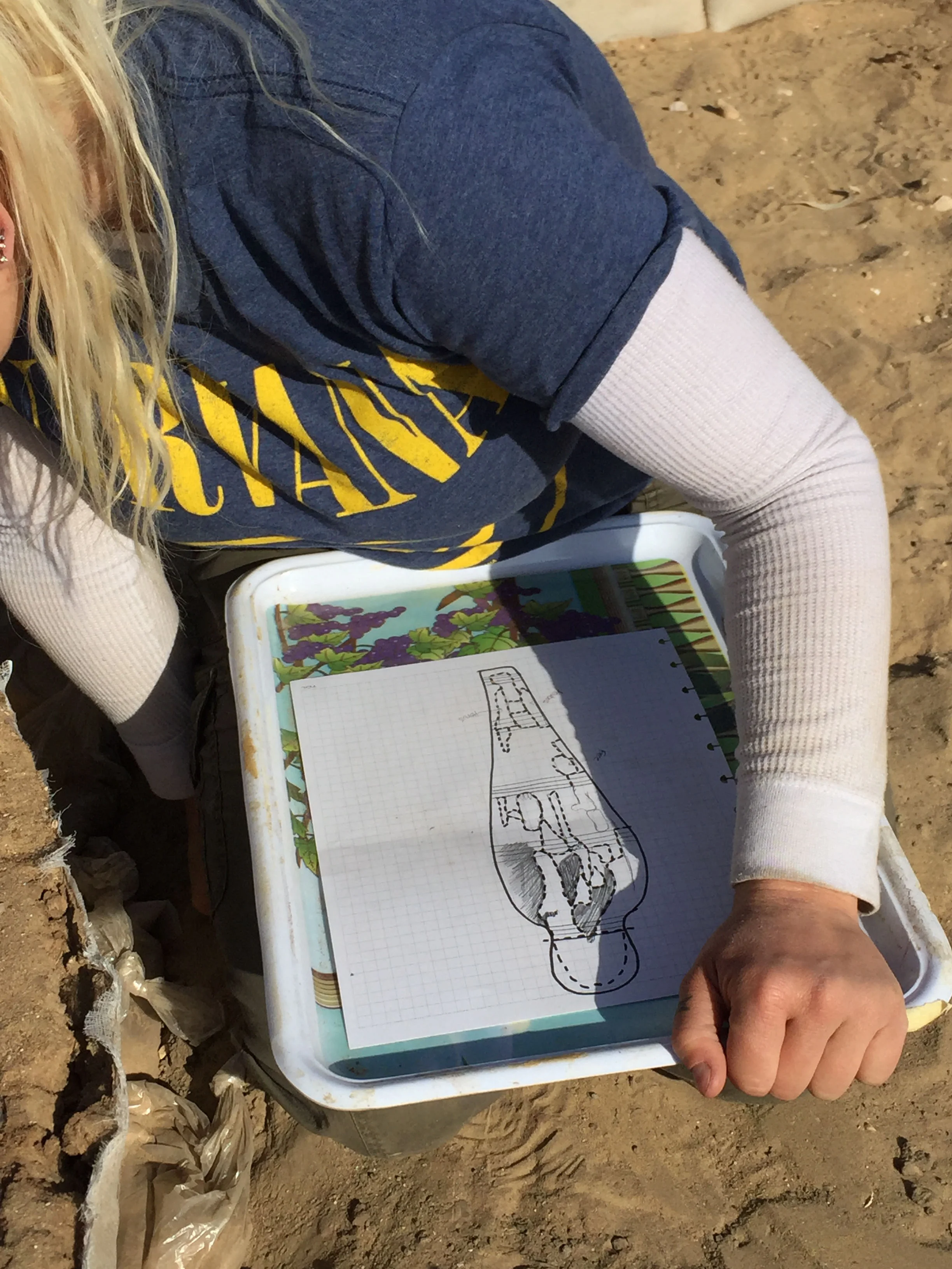 Fig. 18. Mapping the position of consolidated coffin fragments for future reconstruction. Photo: Wendy Doyon / North Abydos Expedition © 2019