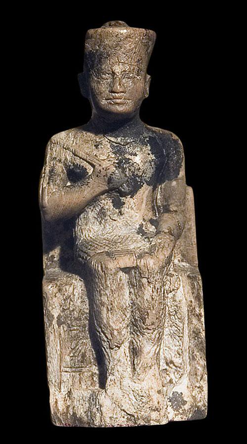 Fig. 4. The Khufu statuette from Abydos is the only surviving representation that bears the king’s name, inscribed beside his right leg and visible at lower left. Photo courtesy of the Egyptian Museum, Cairo