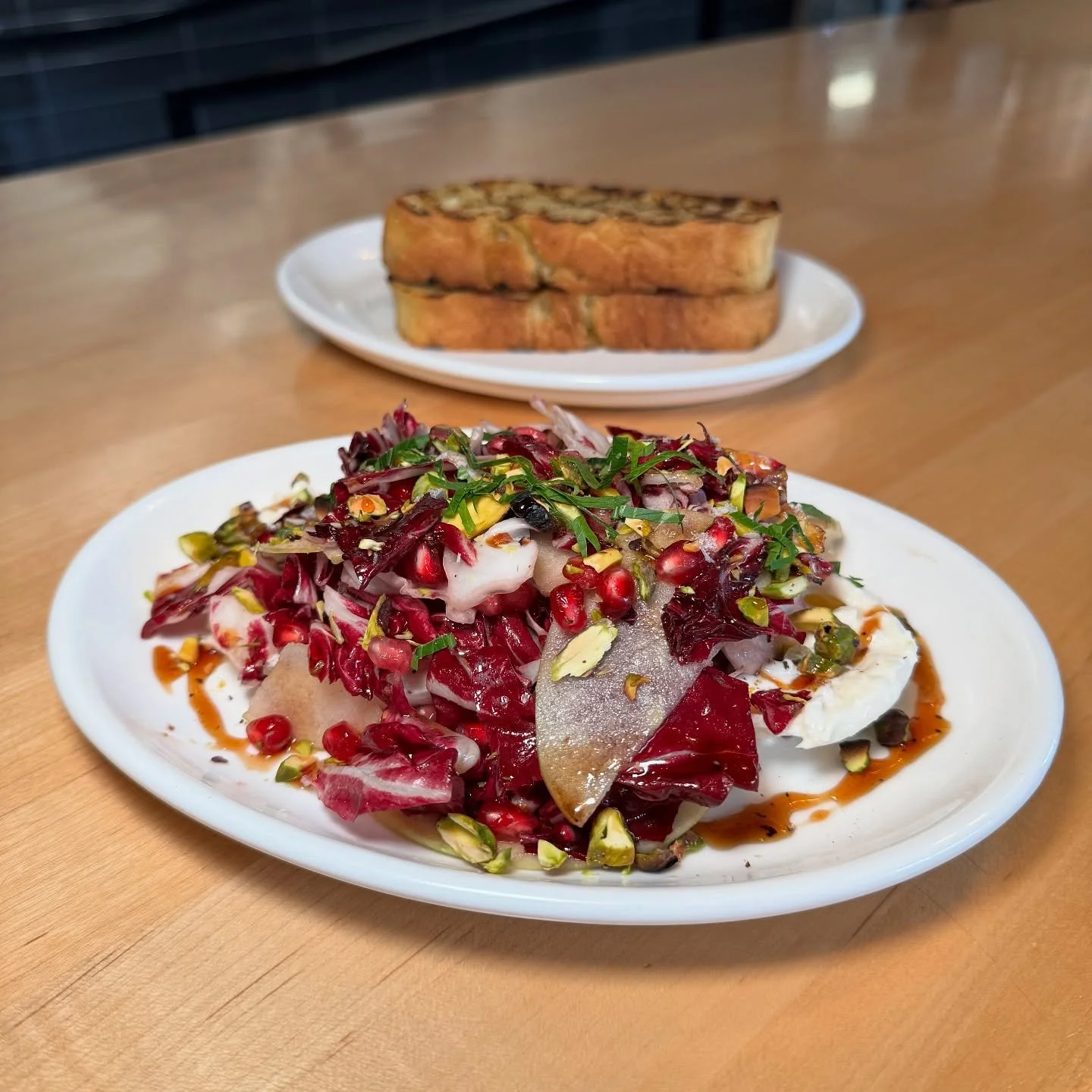 The weather is getting colder and the holidays are right around the corner. &hearts;️ Our burrata screams all things in season. Made with honey crisp apple, 🍎 pomegranate, radicchio, and a side of grilled bread. Don&rsquo;t miss this one, we&rsquo;r