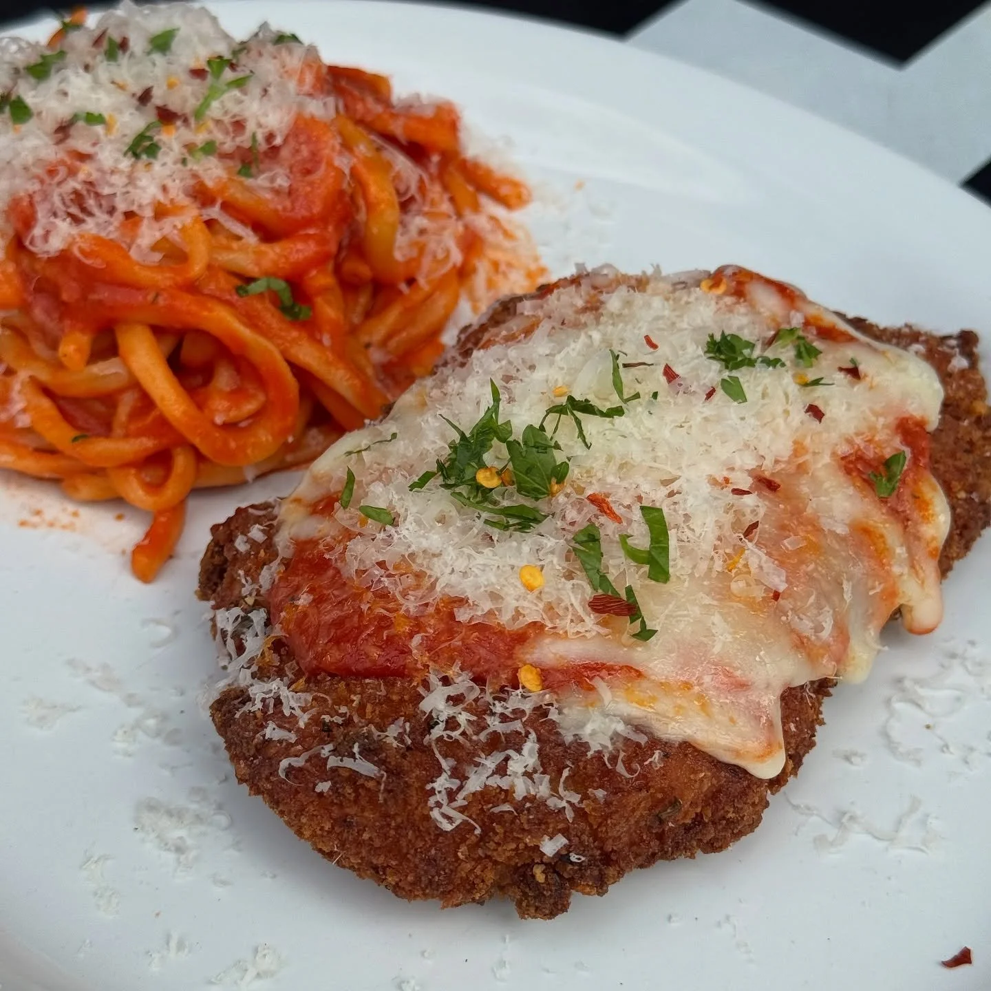 It&rsquo;s Italian American Wednesday and we are 🔁 rolling this one back! Chicken Parm is on the table, and we are open regular hours today from 11am-10pm. &hearts;️ 🍝 Swing through for some comfort food and handmade pasta, only at @grassapdx! 
&bu