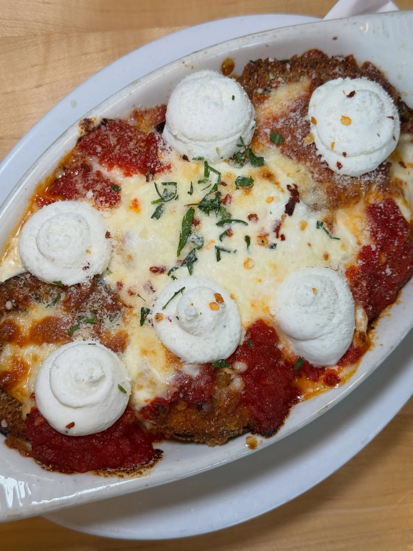 Eggplant parm because it&rsquo;s Italian-American Wednesday and yes, we&rsquo;re yelling it for the people in the back! 📣🍆🧀

Lunch plans? Handled. Swing on by and let that crispy, cheesy, saucy goodness take care of you. See you soon! 💜 

We&rsqu