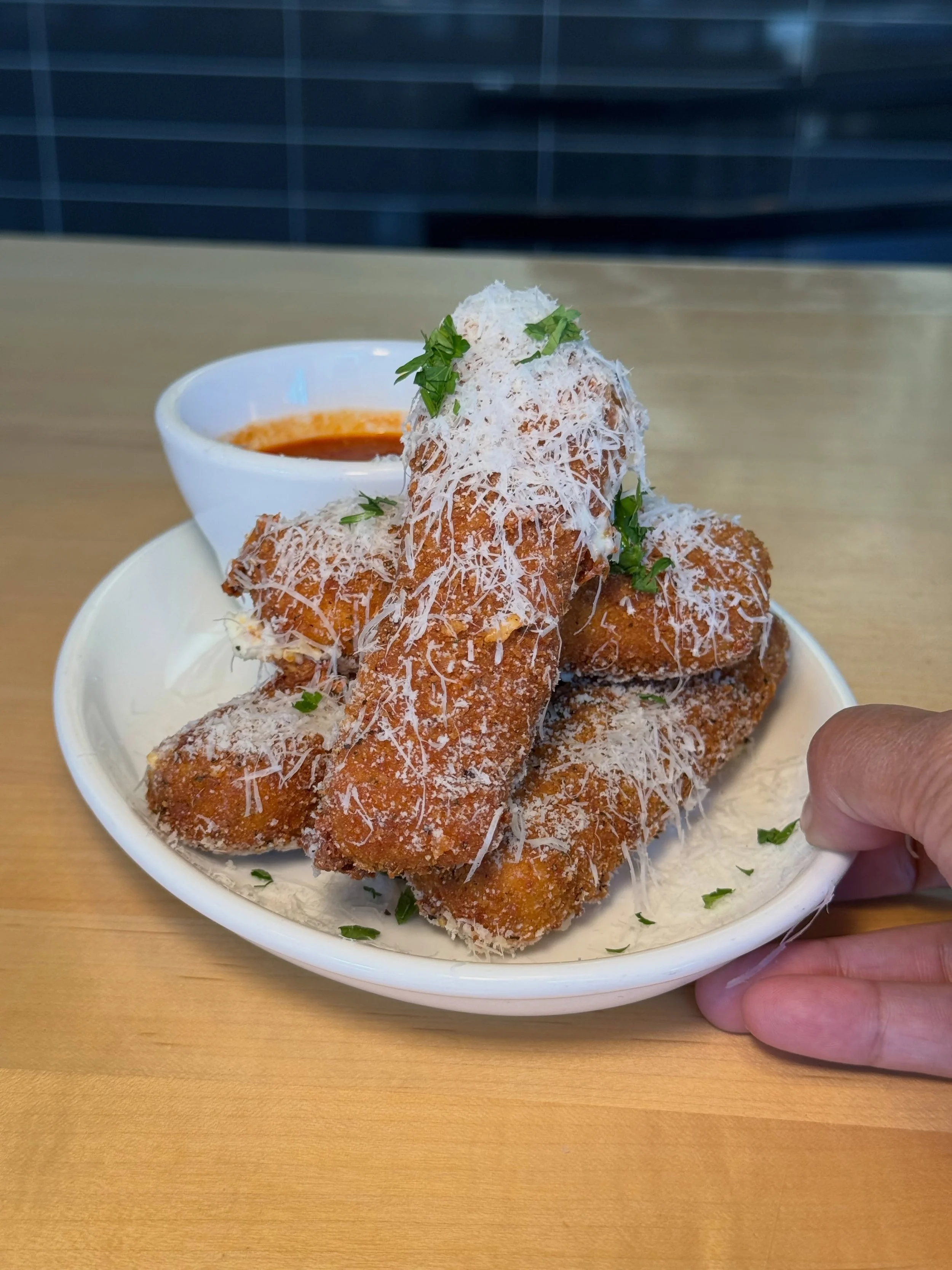 IT&rsquo;S. ITALIAN. AMERICAN. WEDNESDAY! 🧀 ✨ We are serving Mozzarella Sticks all day long and don&rsquo;t worry, 😉 you&rsquo;ll definitely get that epic cheese pull action! 😮 We open at 11am, so don&rsquo;t miss these bad boys in action. See you