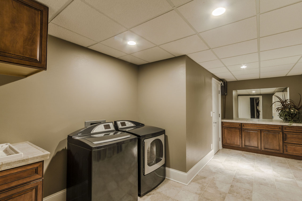 Lower level staff quarters and laundry area.jpg