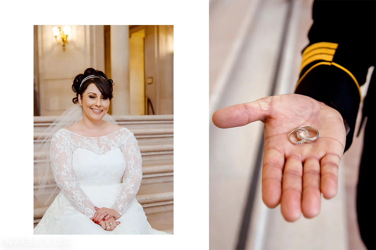 the bride in the white dress is sitting in the staircases, groom's hand shows two wedding rings