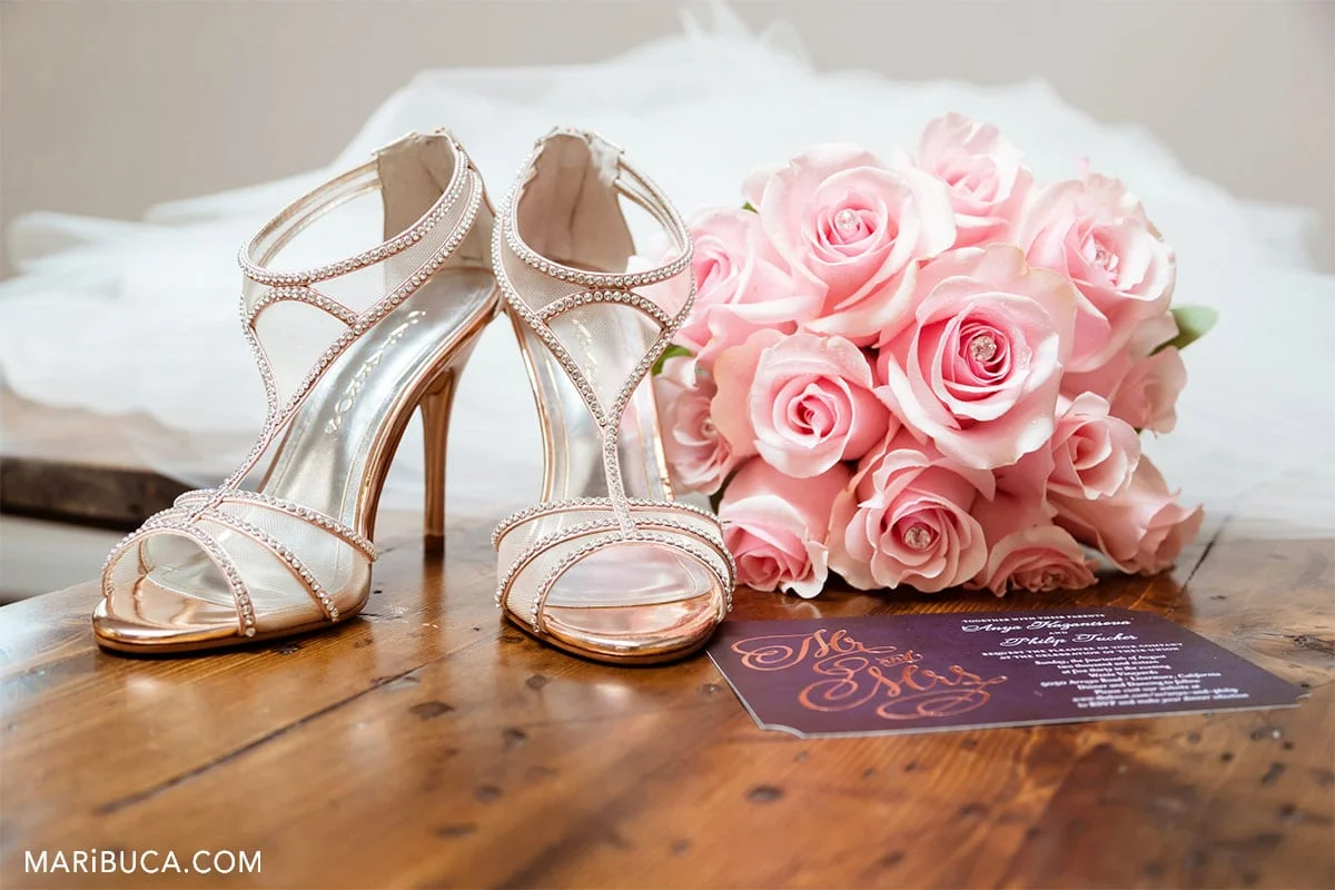 Wedding preparation: wedding shoes, wedding bouquet and wedding invitation