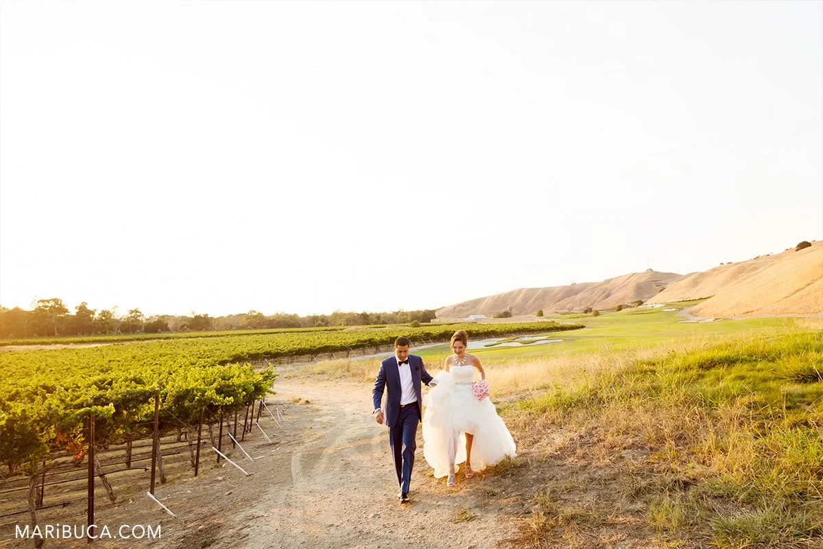 Bride and groom run to reception.