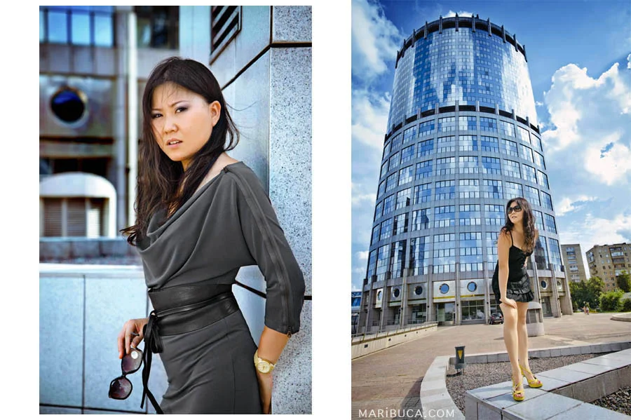 portrait of a girl in a gray dress leaned against a light gray wall. A girl in a black dress stands on the background of a high-rise in the downtown.