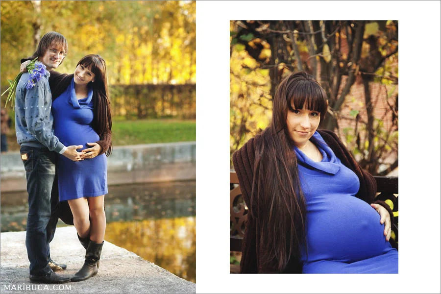 A guy and a pregnant girl are standing on the background of a pond and golden trees during sunset.