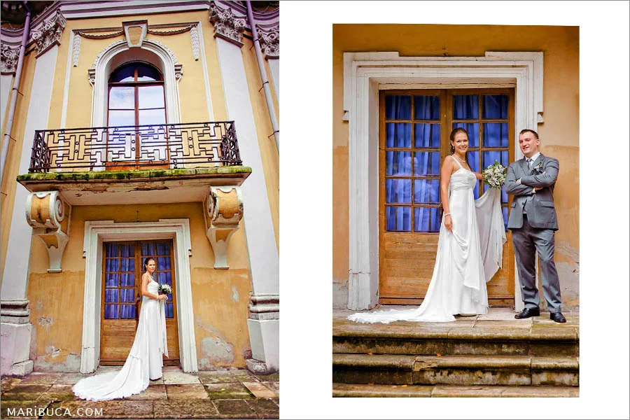The bride stands against the yellow textured yellow old historic building, the bride and groom stand against the background of the door with purple curtains.