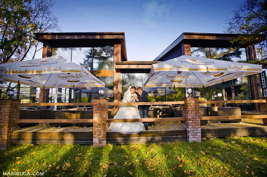 beautiful wedding couple and amazing yellow sunset in the wedding photo session