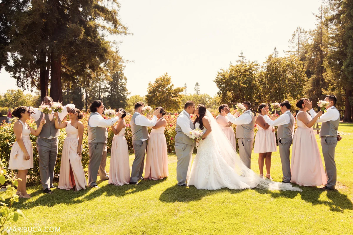 39__39-sj-rose-garden-wedding-party-photography-kiss.jpg