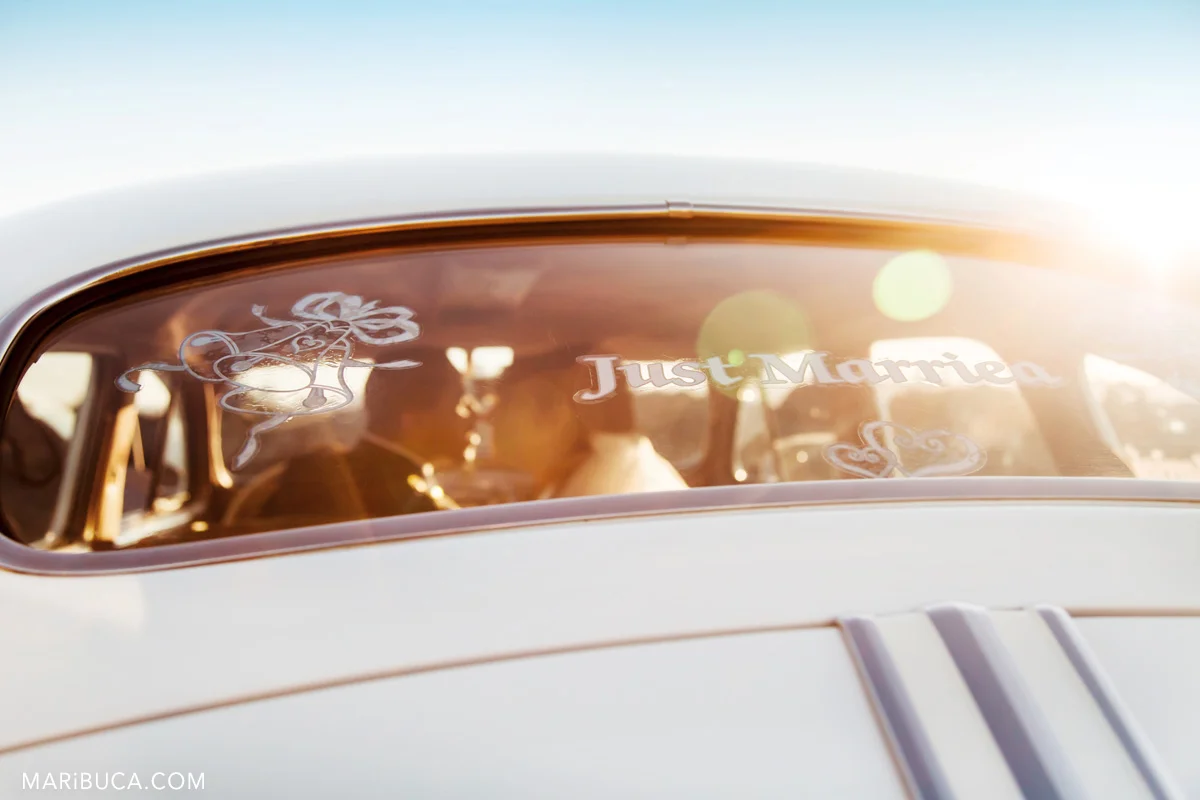 49__49-treasure-island-wedding-kissing-in-the-car-san-francisco.jpg
