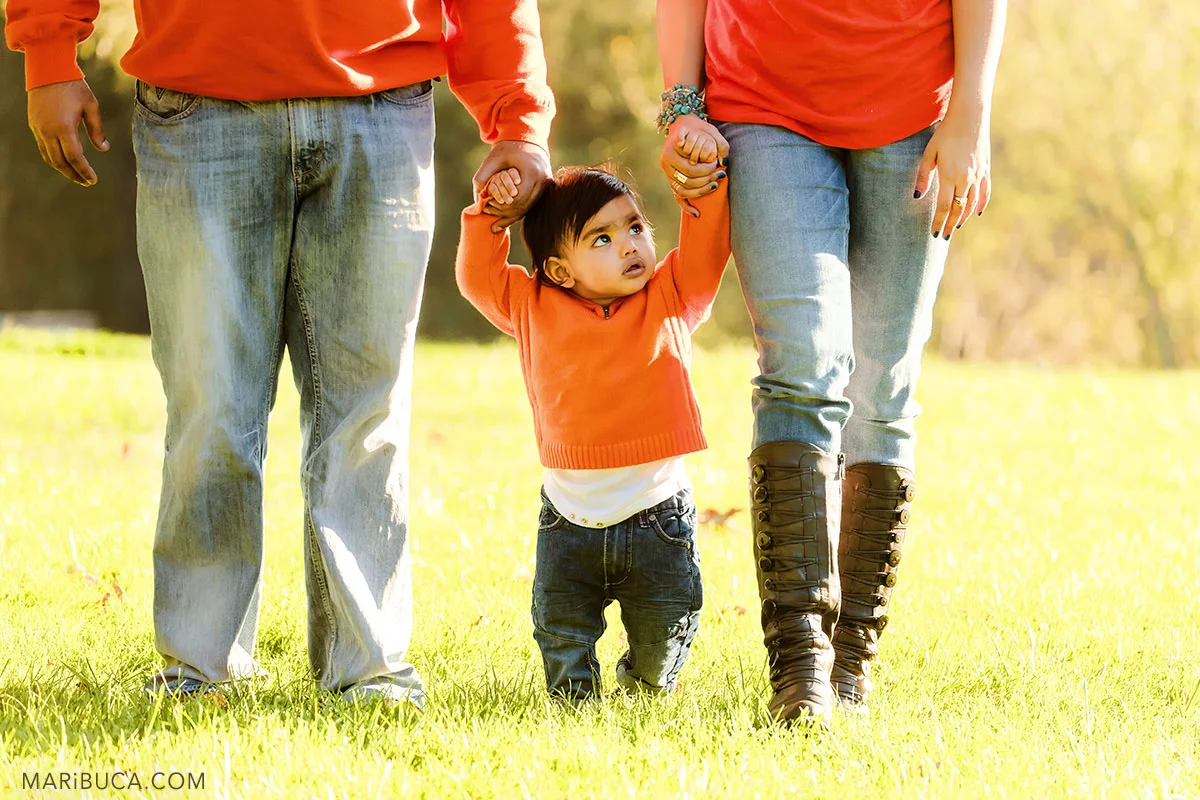 31-baby-parents-session-blue-jeans-orange-sweater-summer-garden-california.jpg