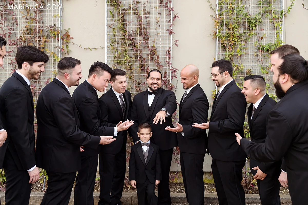 Groom shows the wedding ring in the villa ragusa