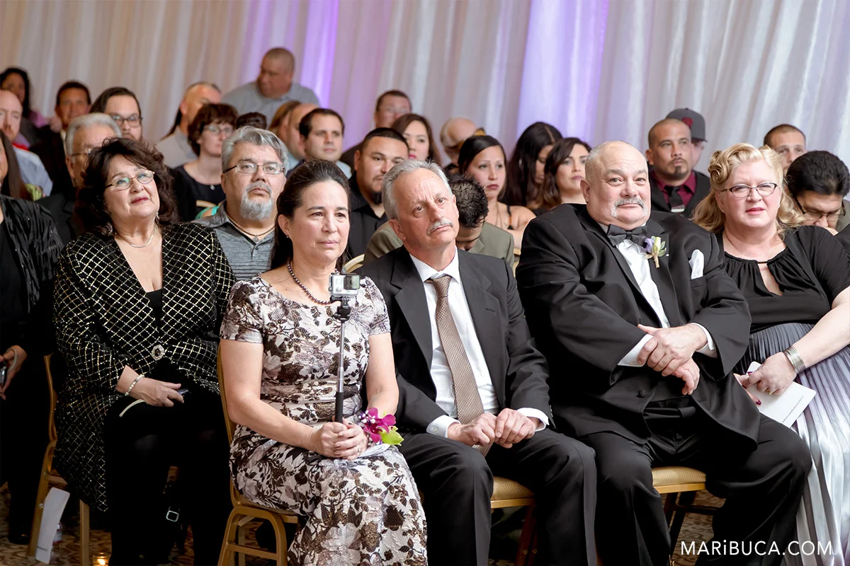 parents looking in the kids in the wedding ceremony Villa Montalvo events