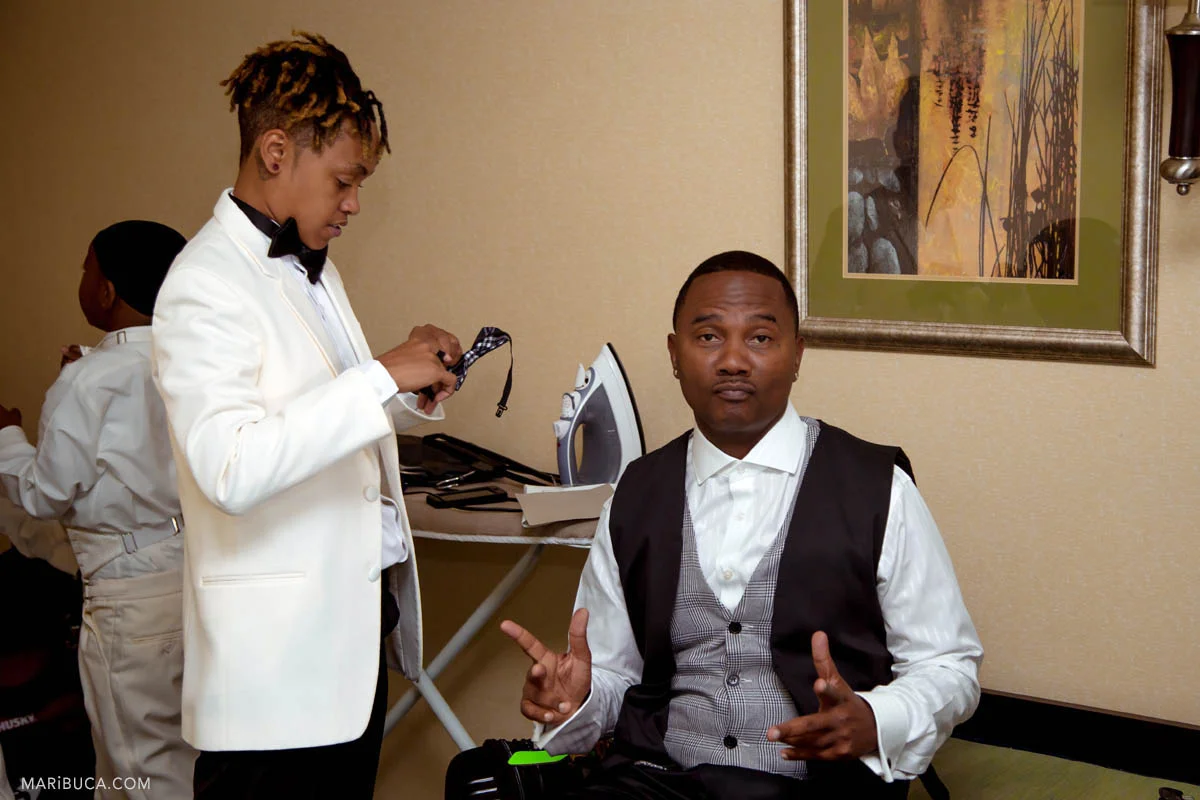 Groomsmen are getting ready in the hotel, Brentwood