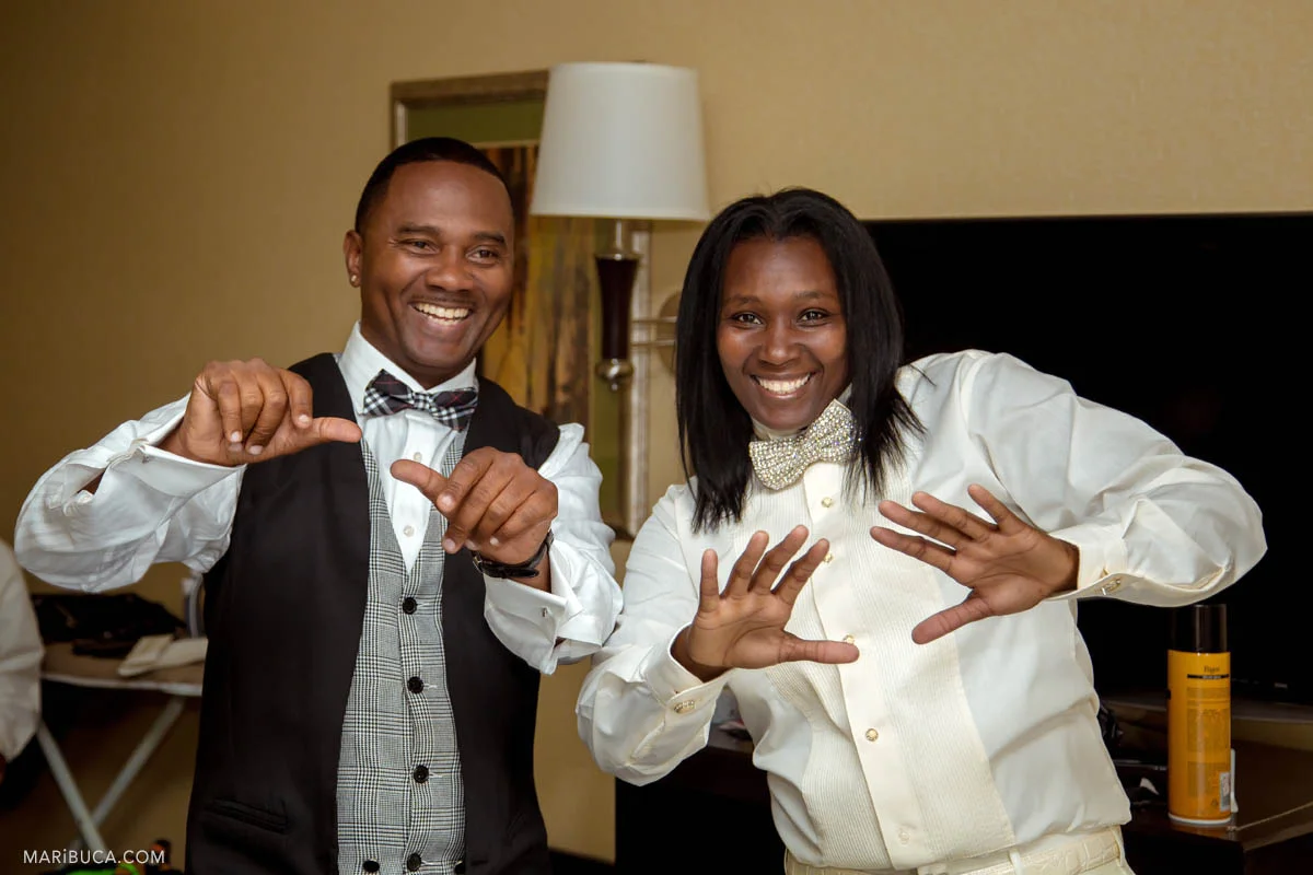 The groom and the groomsmen have fun in the hotel during the getting ready