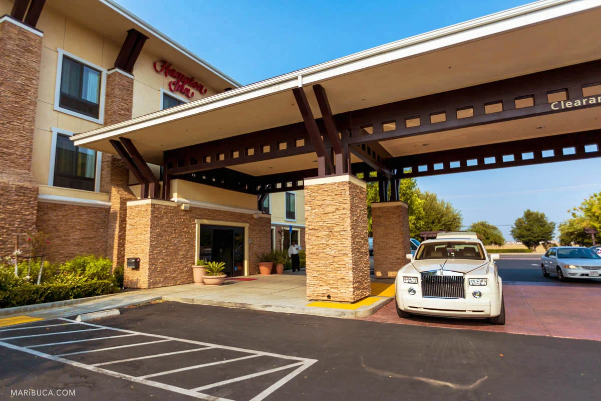 The Hampton Inn hotel and the white limo in the Brentwood wedding