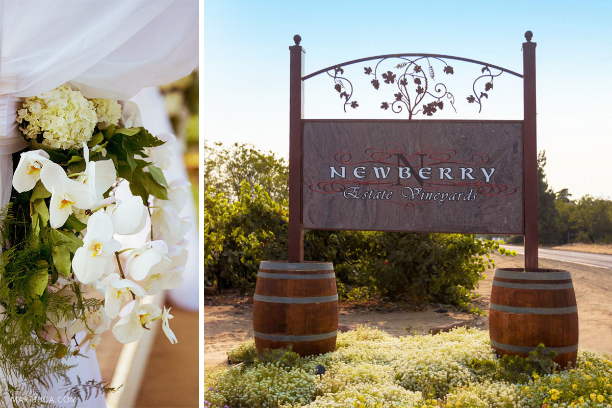 Wedding decoration: white flowers, Newberry Estate Vineyards sign with leaves decoration on it.